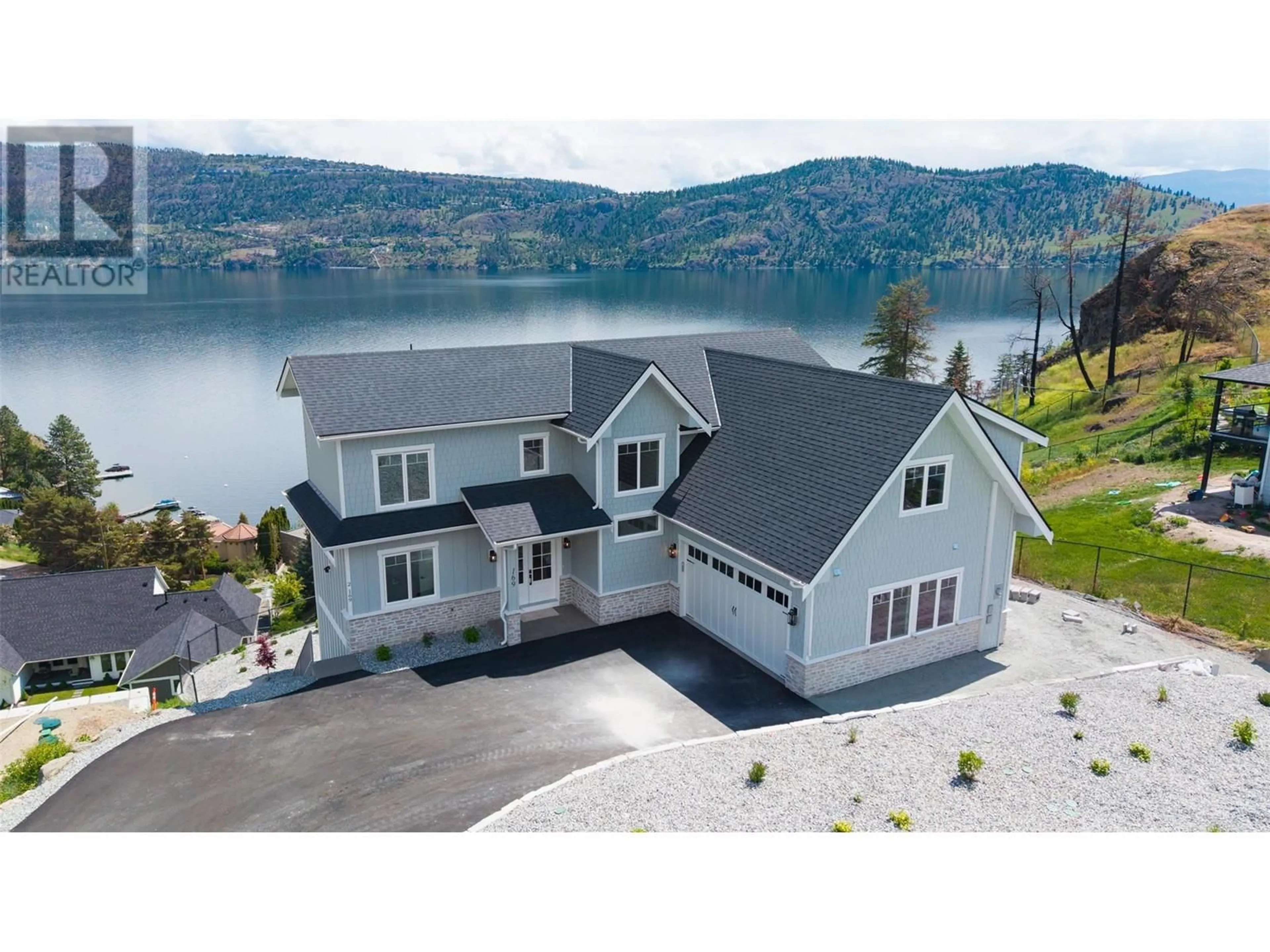 Home with vinyl exterior material, water/lake/river/ocean view for 169 TRADERS COVE ROAD, West Kelowna British Columbia V1Z3S4