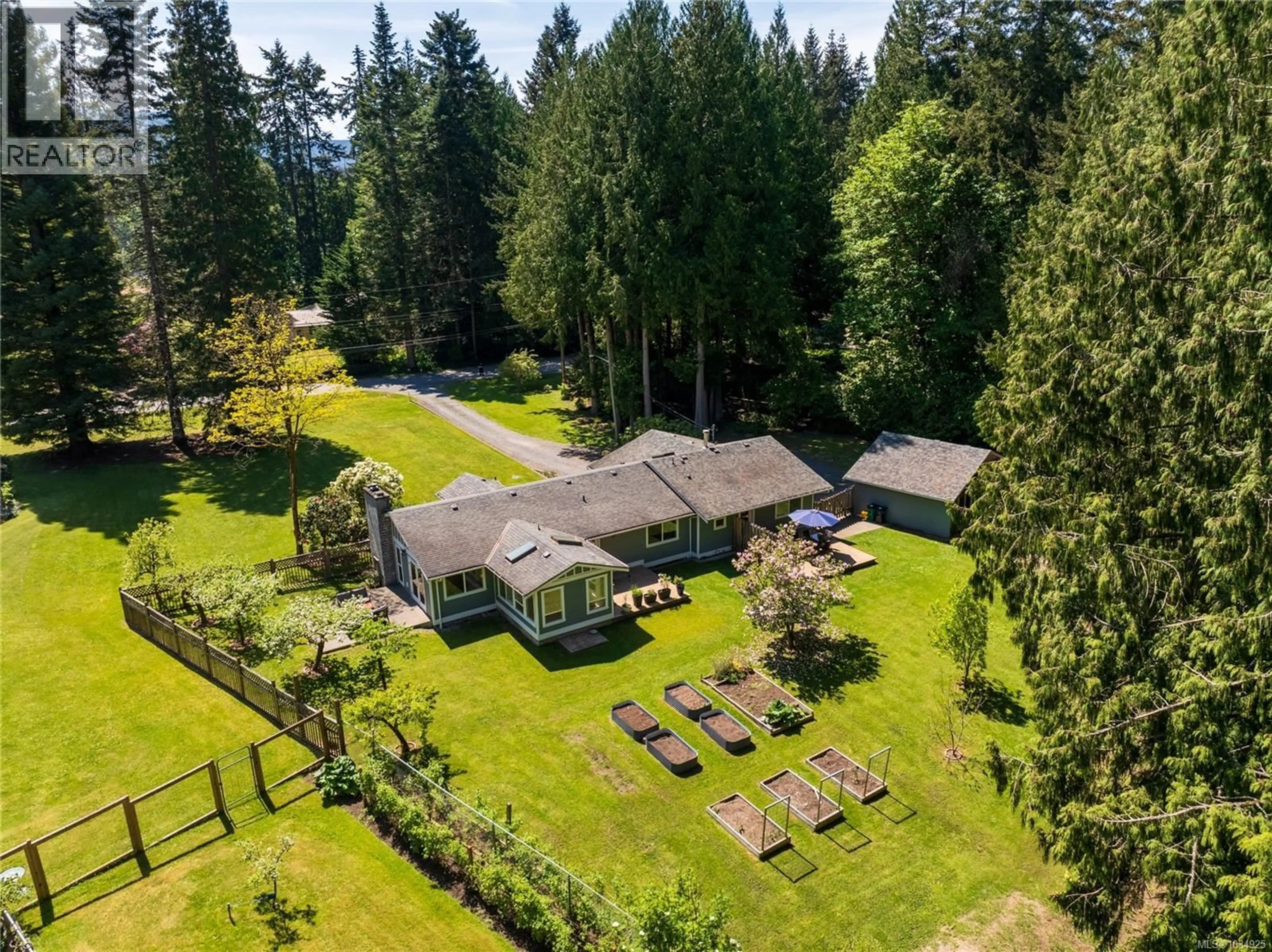 A pic from outside/outdoor area/front of a property/back of a property/a pic from drone, forest/trees view for 2905 WILKINSON ROAD, Mill Bay British Columbia V0R2P0