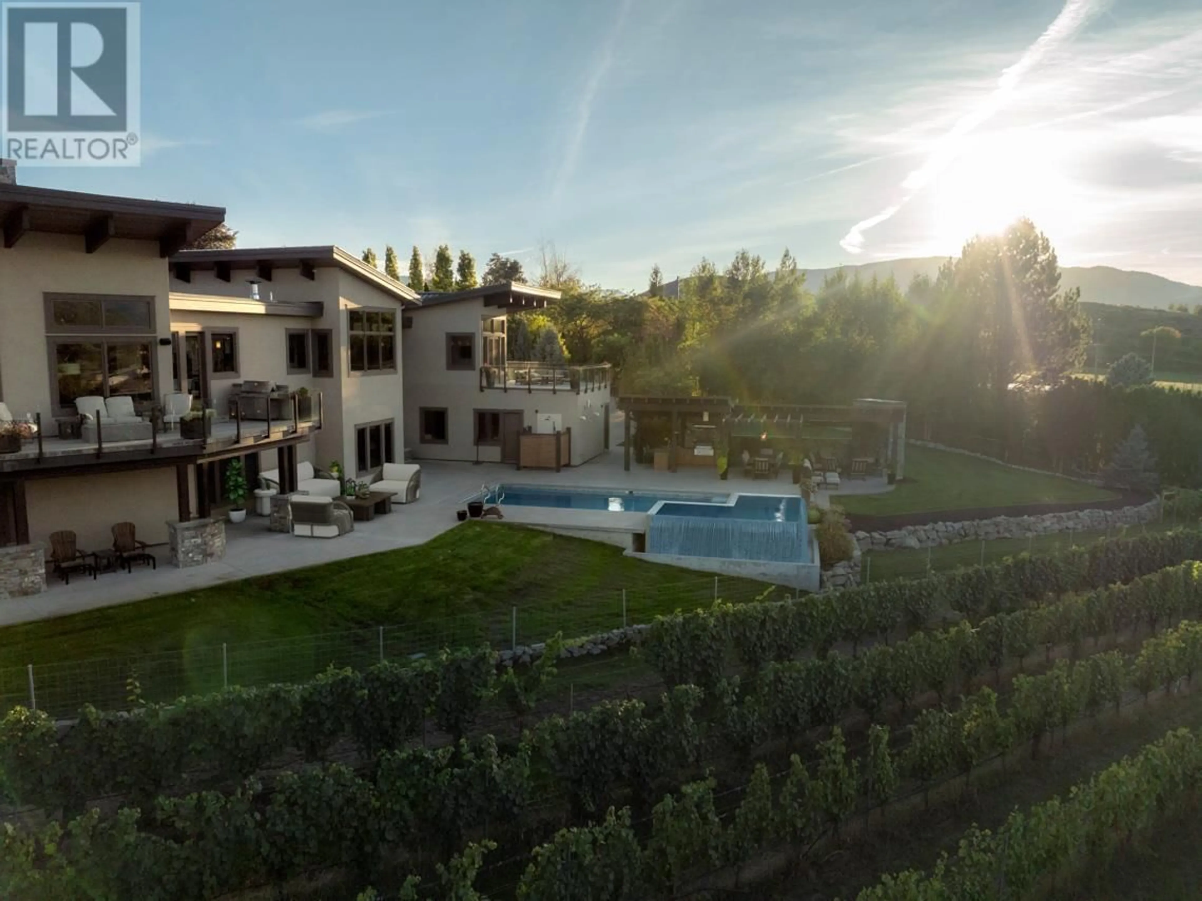 A pic from outside/outdoor area/front of a property/back of a property/a pic from drone, mountain view for 1291 CORBISHLEY AVENUE, Penticton British Columbia V2A8V2