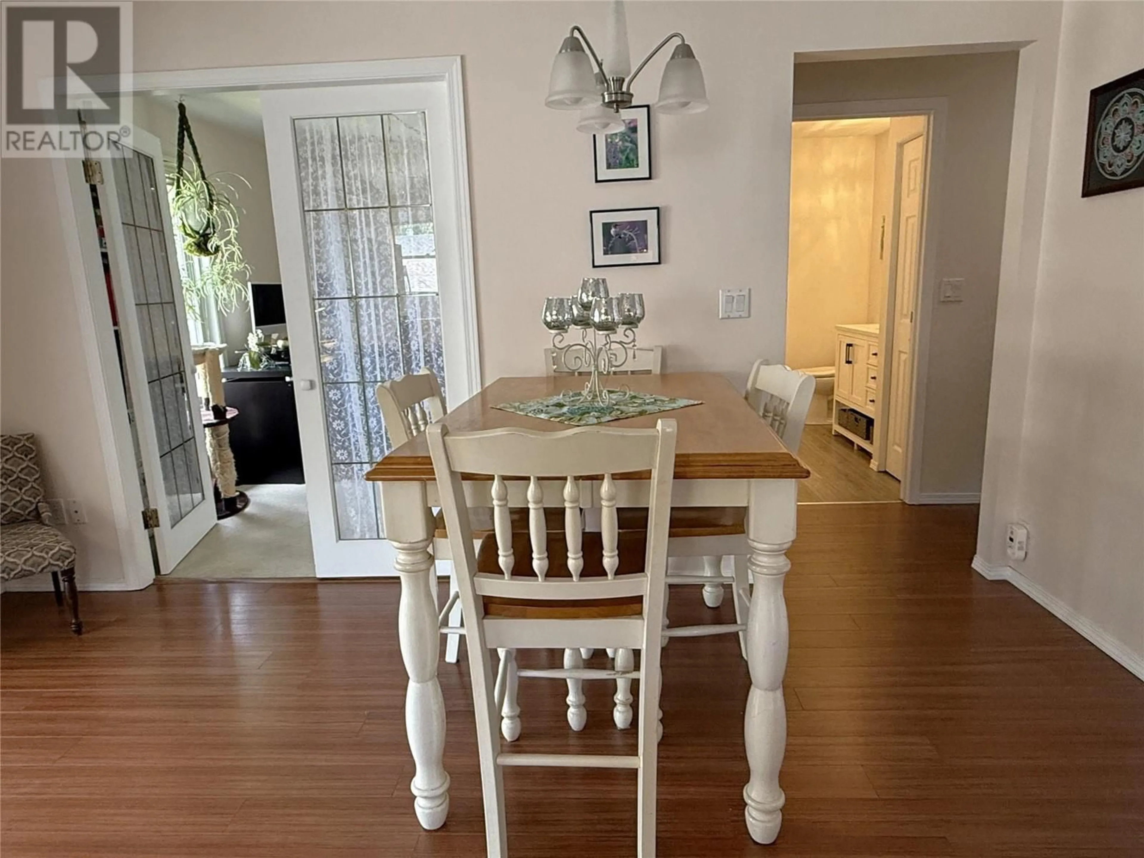 Dining room, wood/laminate floor for 1 - 1717 GRANITE AVENUE, Merritt British Columbia V1K1B8