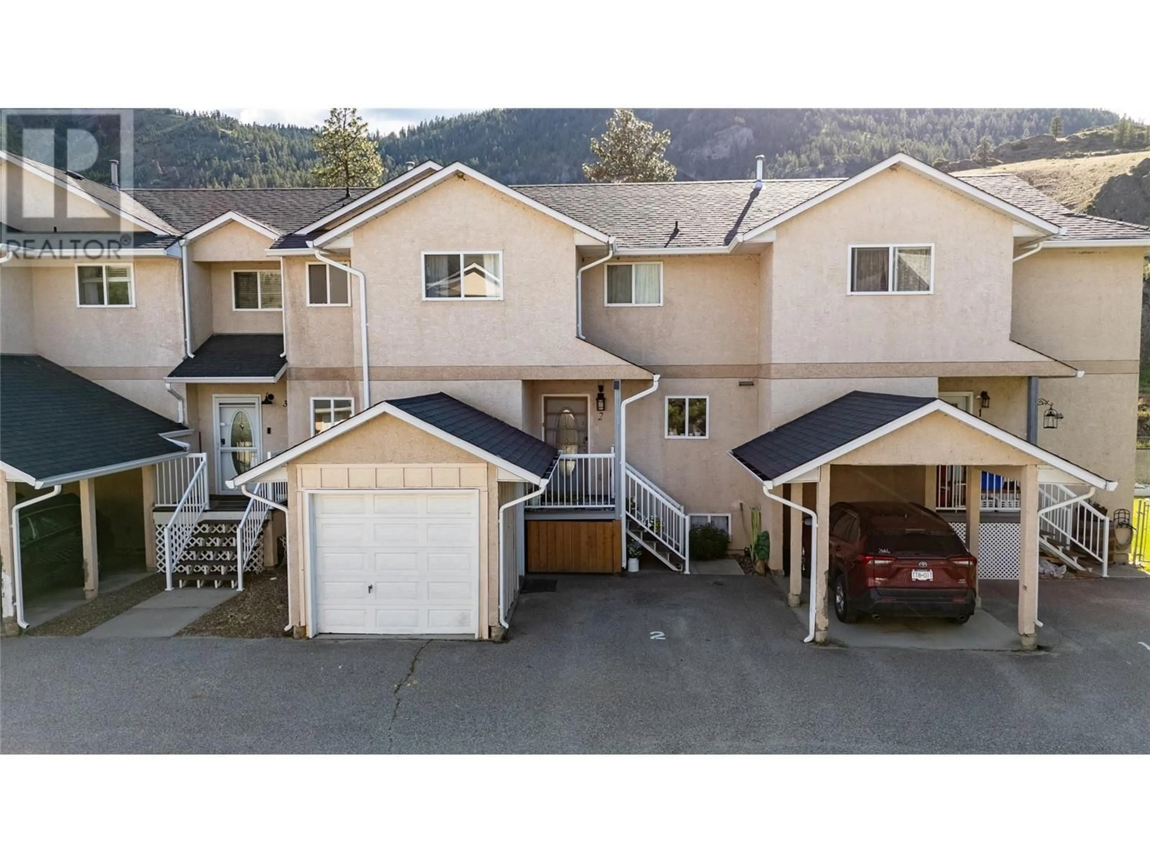 A pic from outside/outdoor area/front of a property/back of a property/a pic from drone, mountain view for 2 - 1032 CEDAR STREET, Okanagan Falls British Columbia V0H1R4