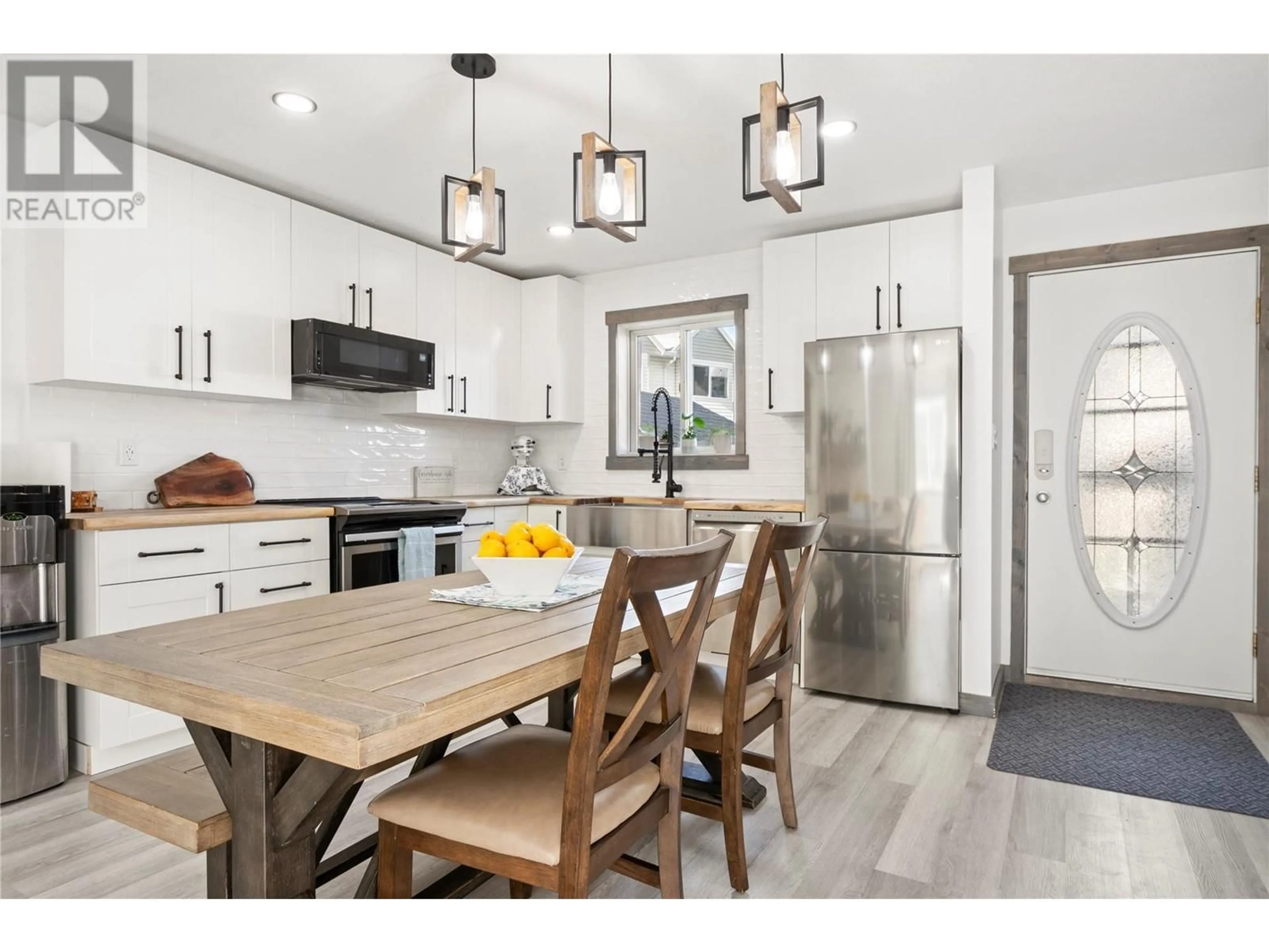 Open concept kitchen, wood/laminate floor for 2 - 1032 CEDAR STREET, Okanagan Falls British Columbia V0H1R4