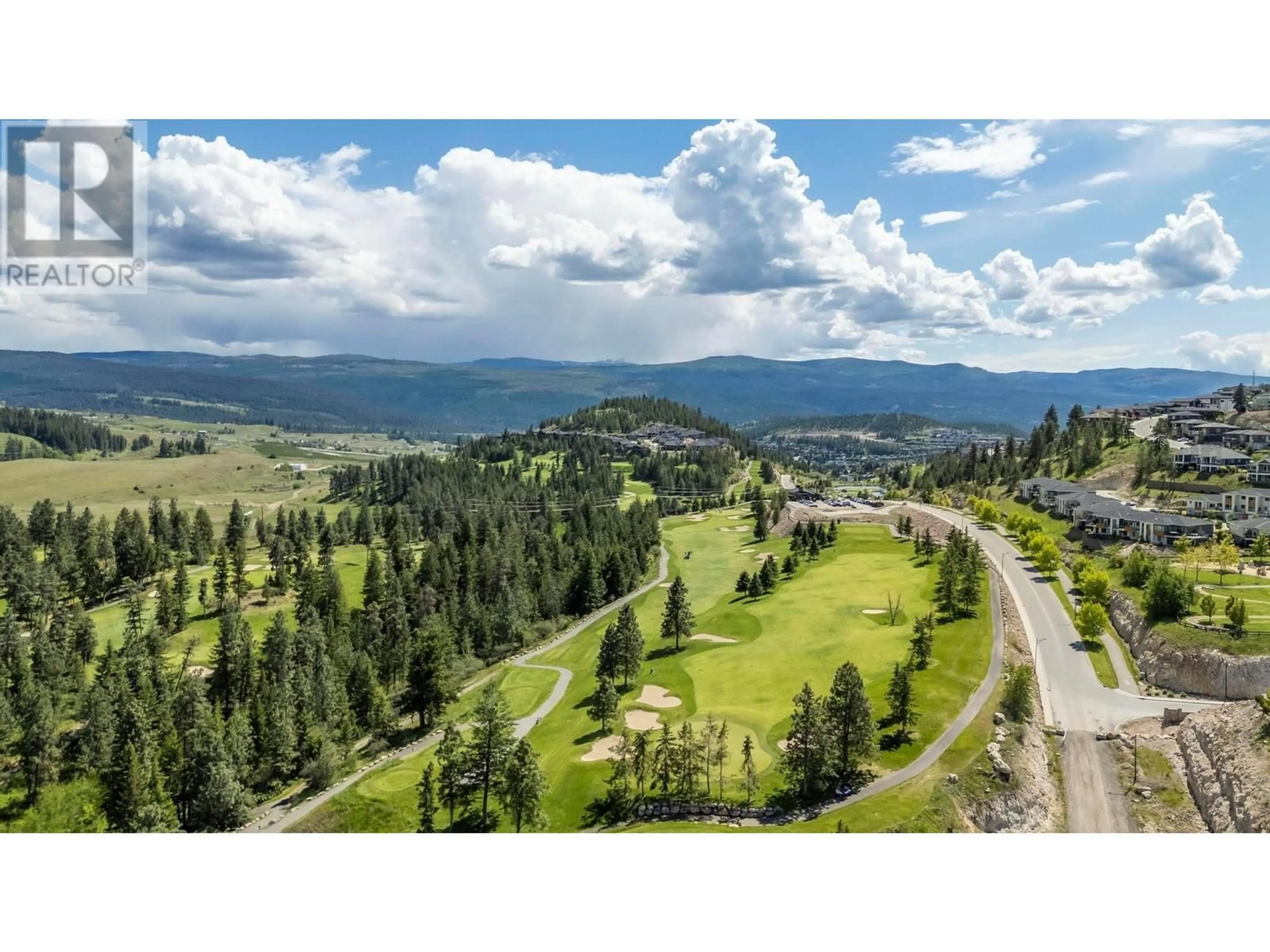 A pic from outside/outdoor area/front of a property/back of a property/a pic from drone, mountain view for 414 DUNBAR COURT, Kelowna British Columbia V1P1T5