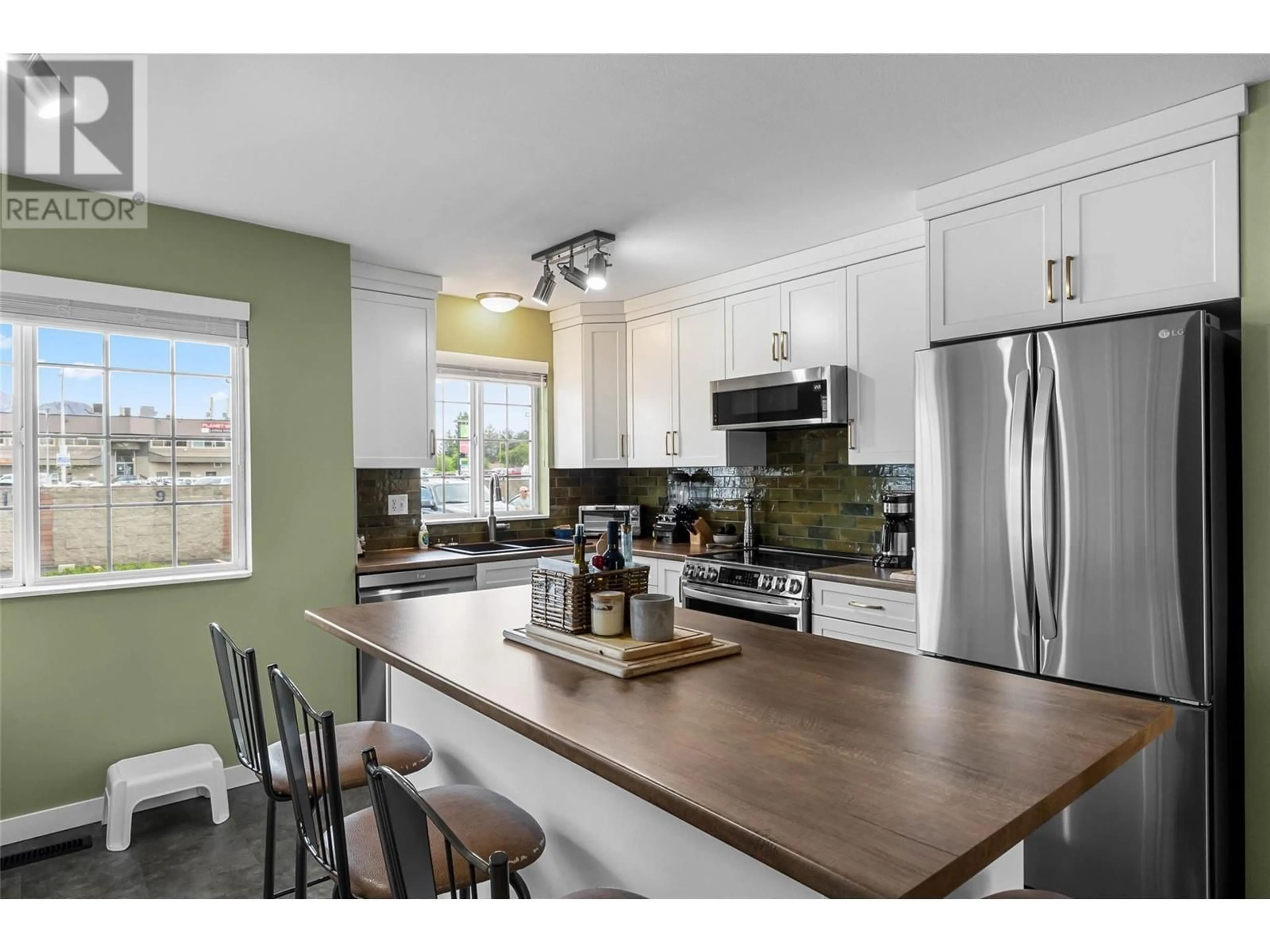 Open concept kitchen, wood/laminate floor for 10 - 1876 TRANQUILLE ROAD, Kamloops British Columbia V2B3L8