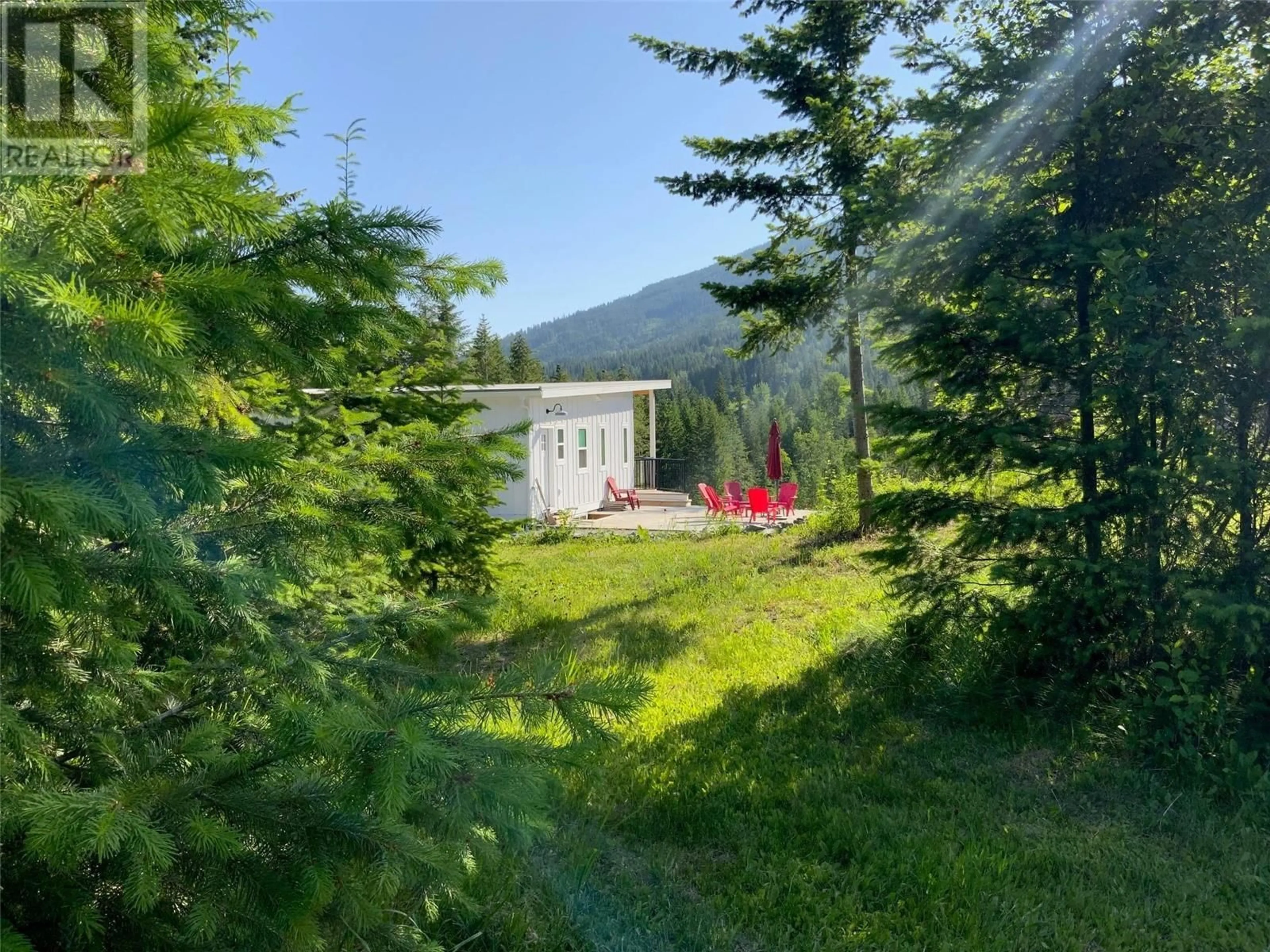 A pic from outside/outdoor area/front of a property/back of a property/a pic from drone, forest/trees view for 5090 50A STREET NORTHEAST, Salmon Arm British Columbia V1E1Y6