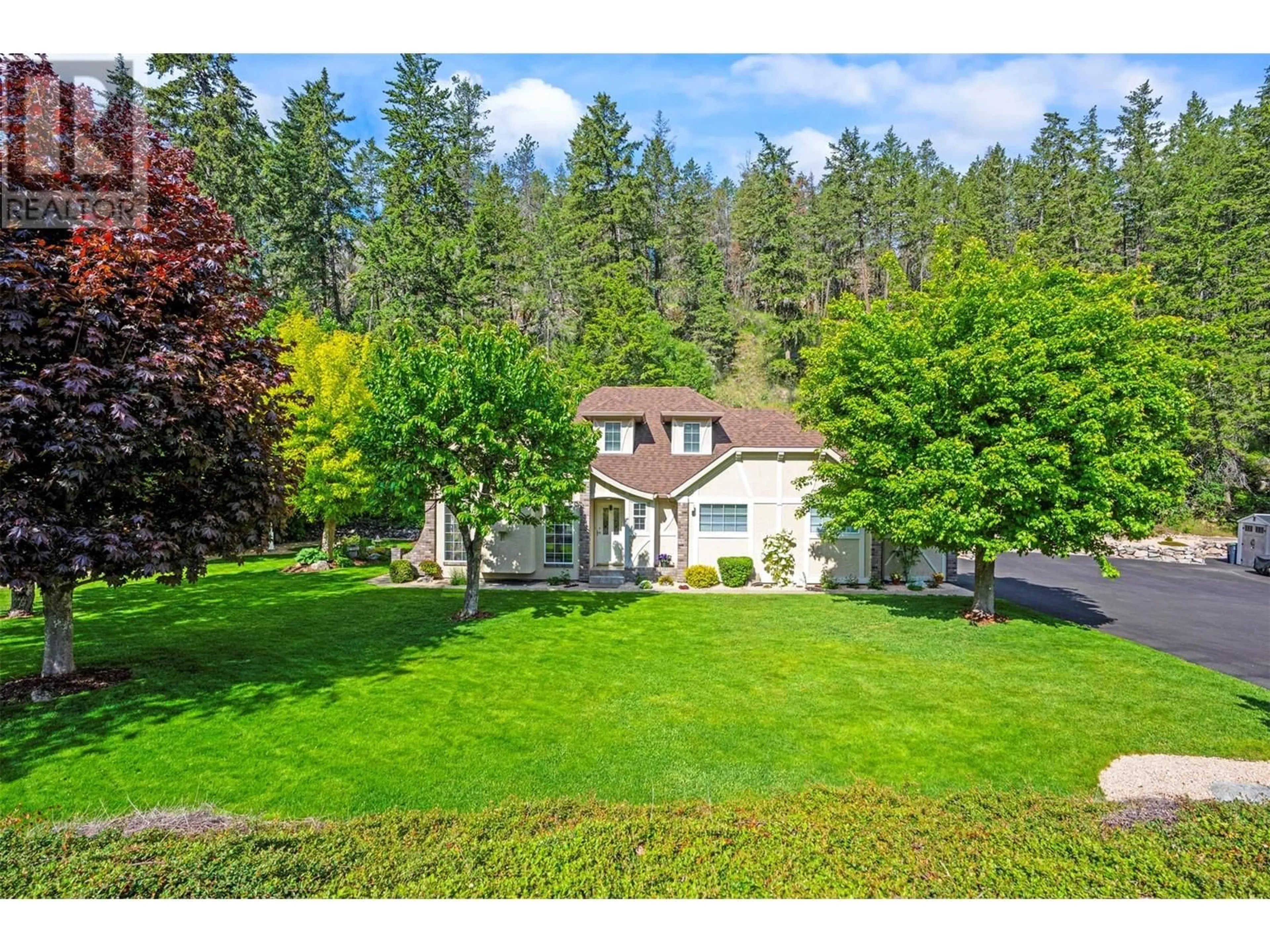 A pic from outside/outdoor area/front of a property/back of a property/a pic from drone, unknown for 9292 CHINOOK ROAD, Vernon British Columbia V1H1K3