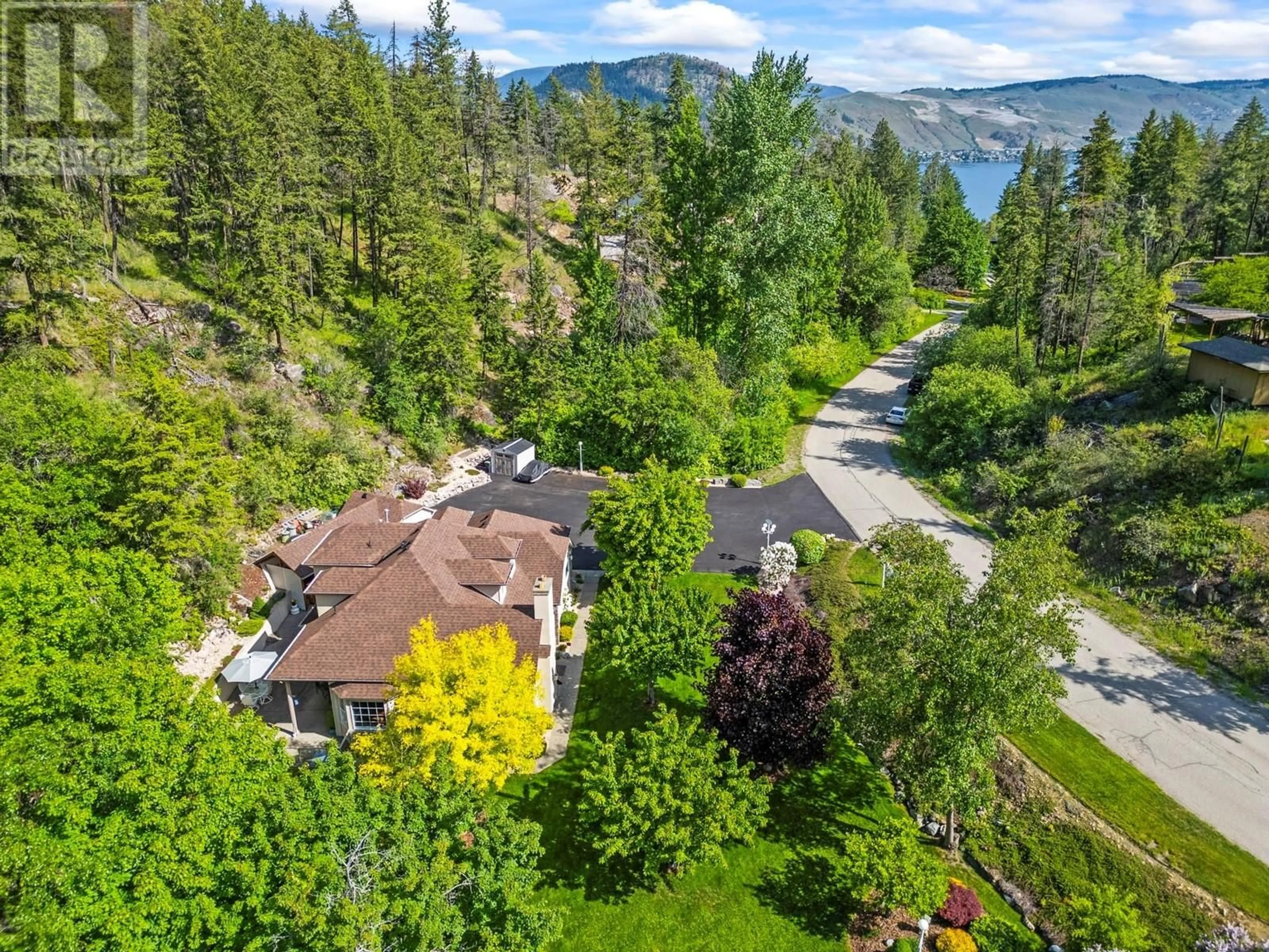 A pic from outside/outdoor area/front of a property/back of a property/a pic from drone, unknown for 9292 CHINOOK ROAD, Vernon British Columbia V1H1K3