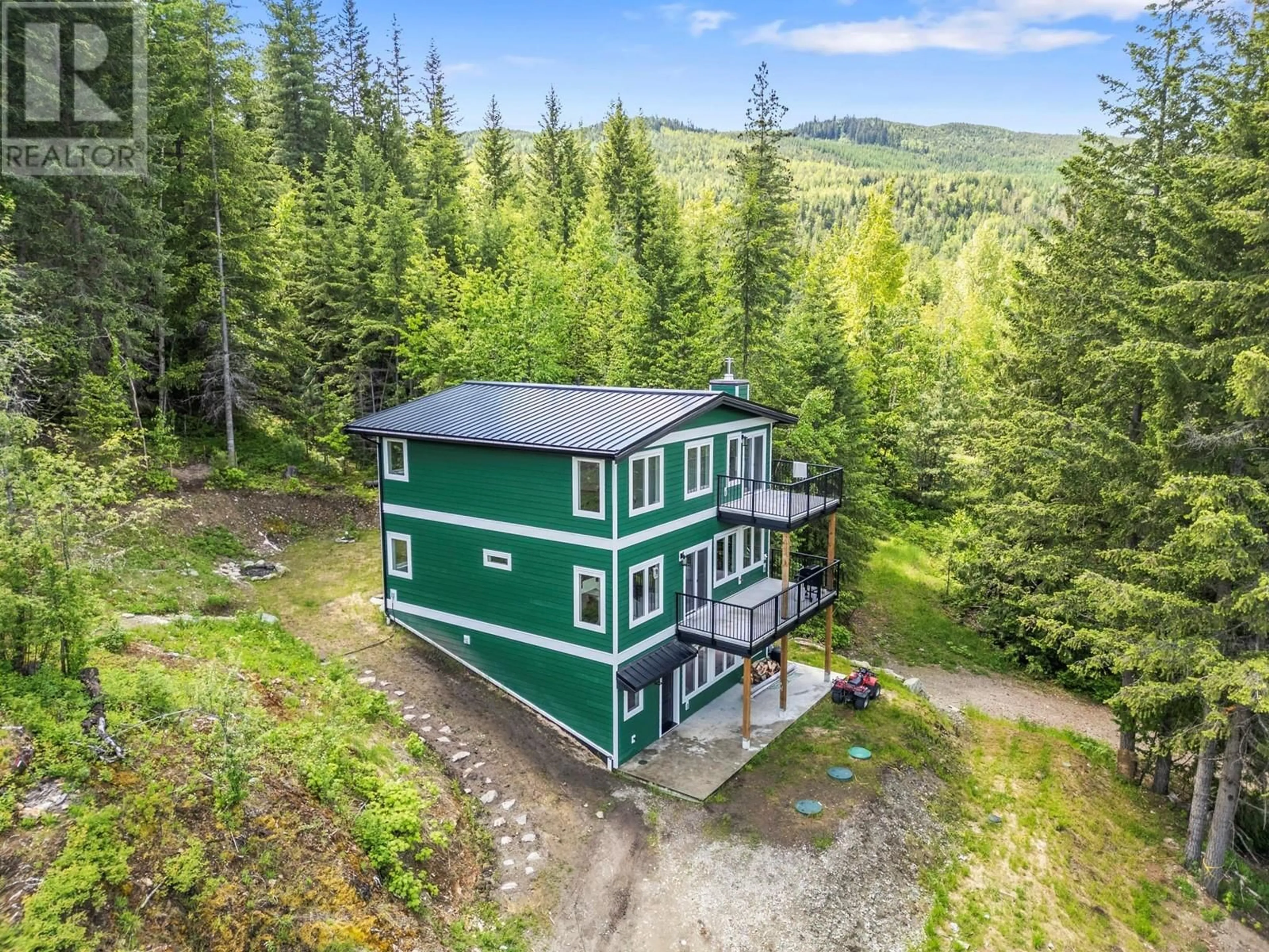 A pic from outside/outdoor area/front of a property/back of a property/a pic from drone, unknown for 5064 RIDGE ROAD, Eagle Bay British Columbia V0E1T0