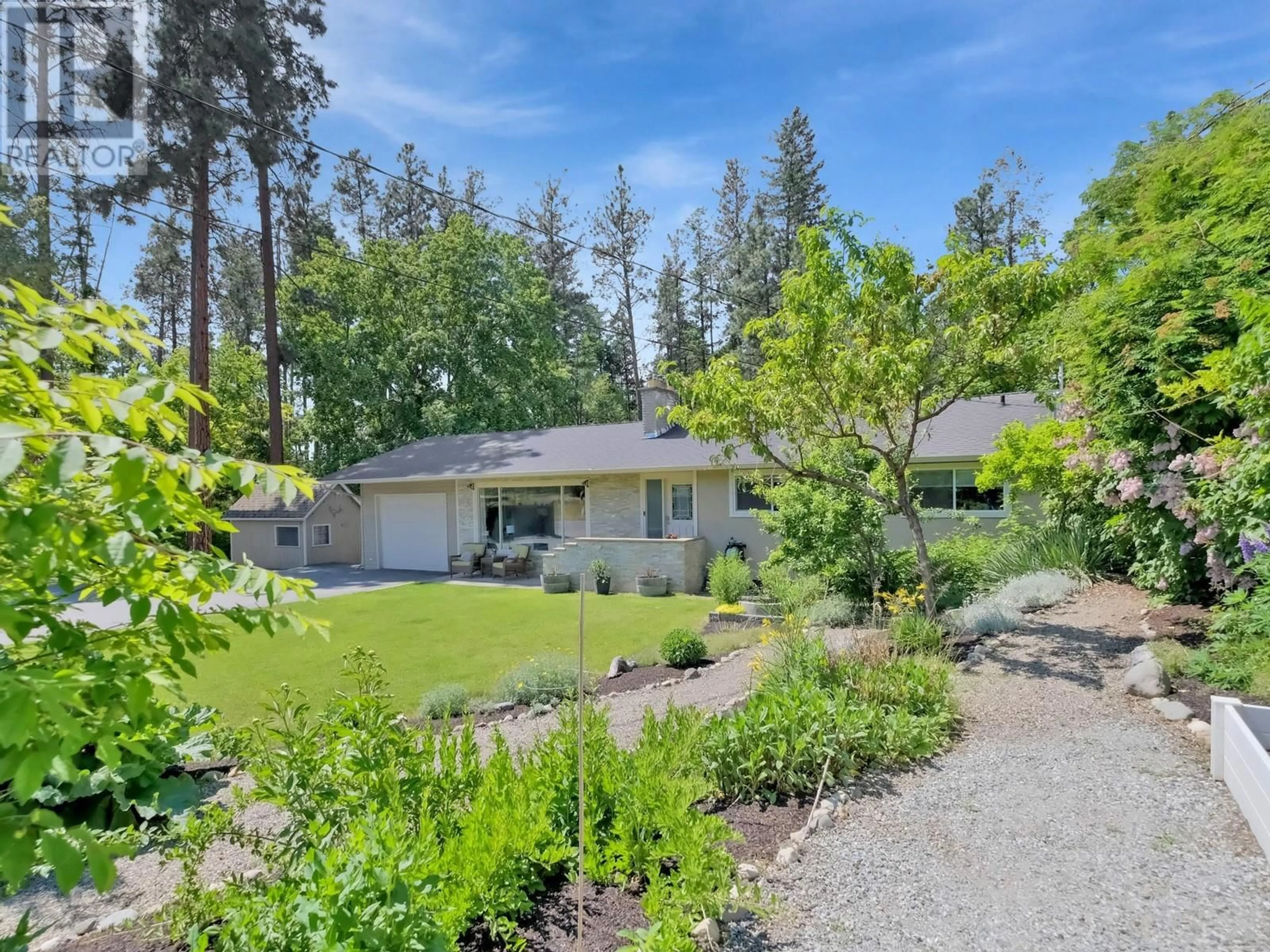A pic from outside/outdoor area/front of a property/back of a property/a pic from drone, street for 1766 GARNER ROAD, Kelowna British Columbia V1P1E5
