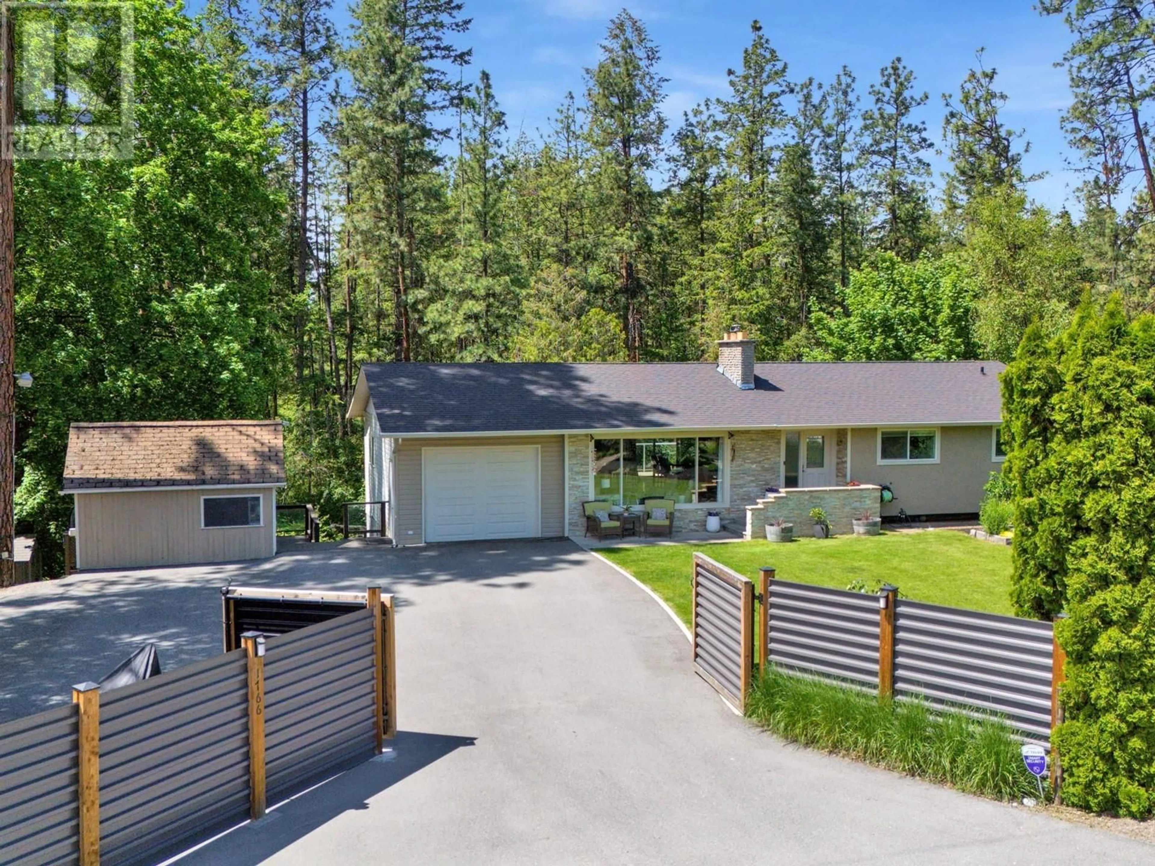 A pic from outside/outdoor area/front of a property/back of a property/a pic from drone, street for 1766 GARNER ROAD, Kelowna British Columbia V1P1E5