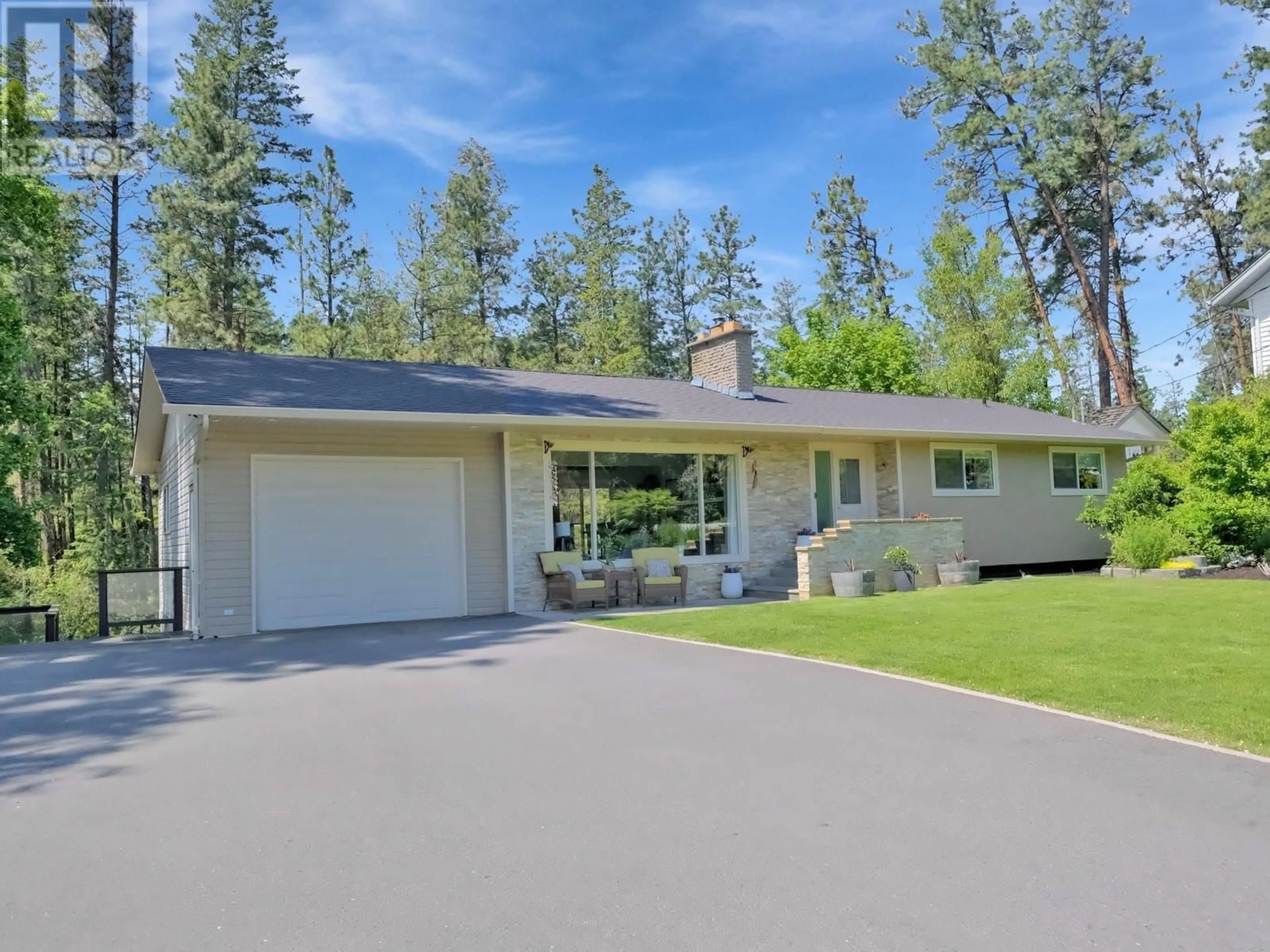 Home with vinyl exterior material, street for 1766 GARNER ROAD, Kelowna British Columbia V1P1E5