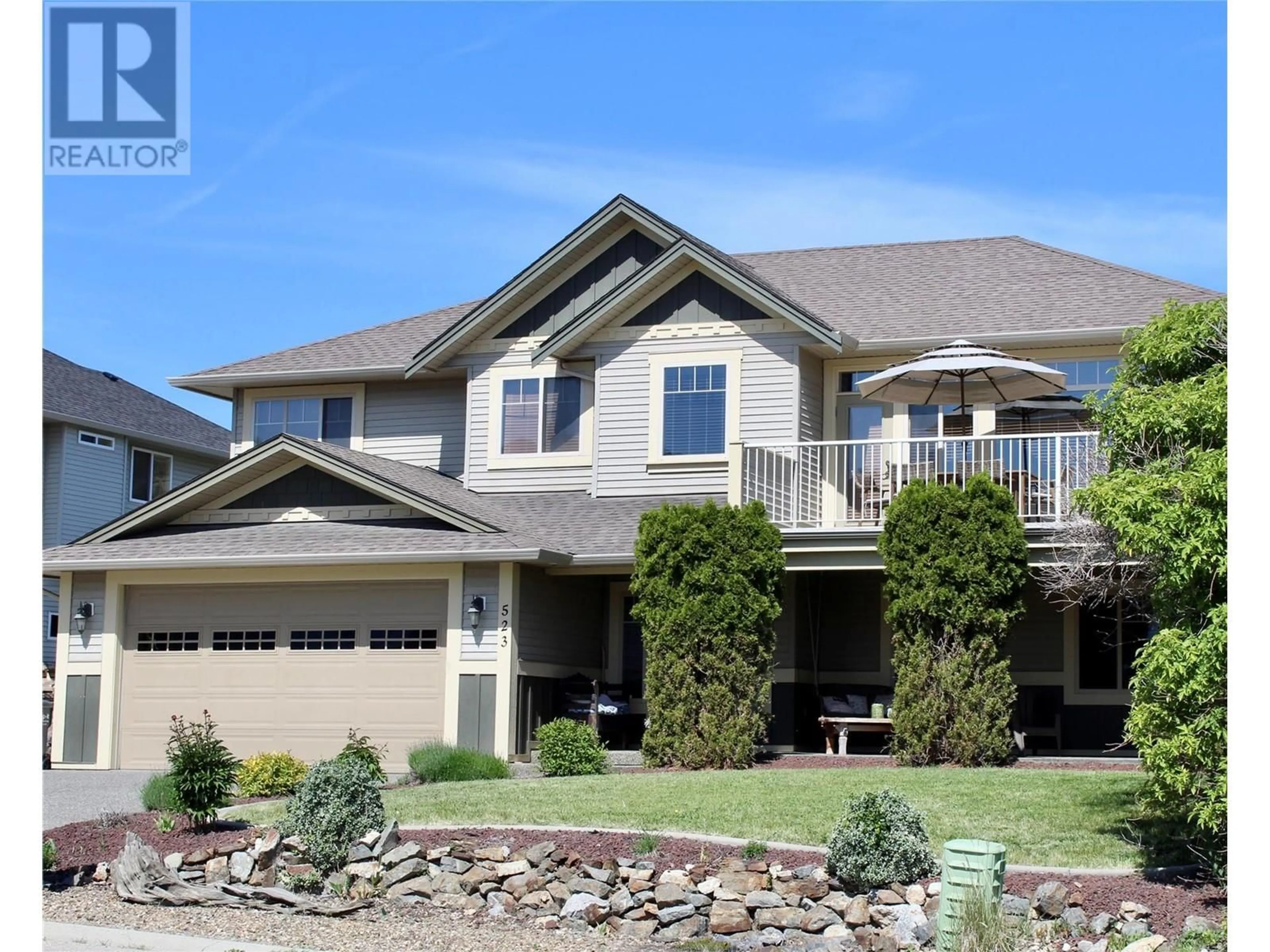 Home with vinyl exterior material, street for 523 MIDDLETON WAY, Coldstream British Columbia V1B3Z8
