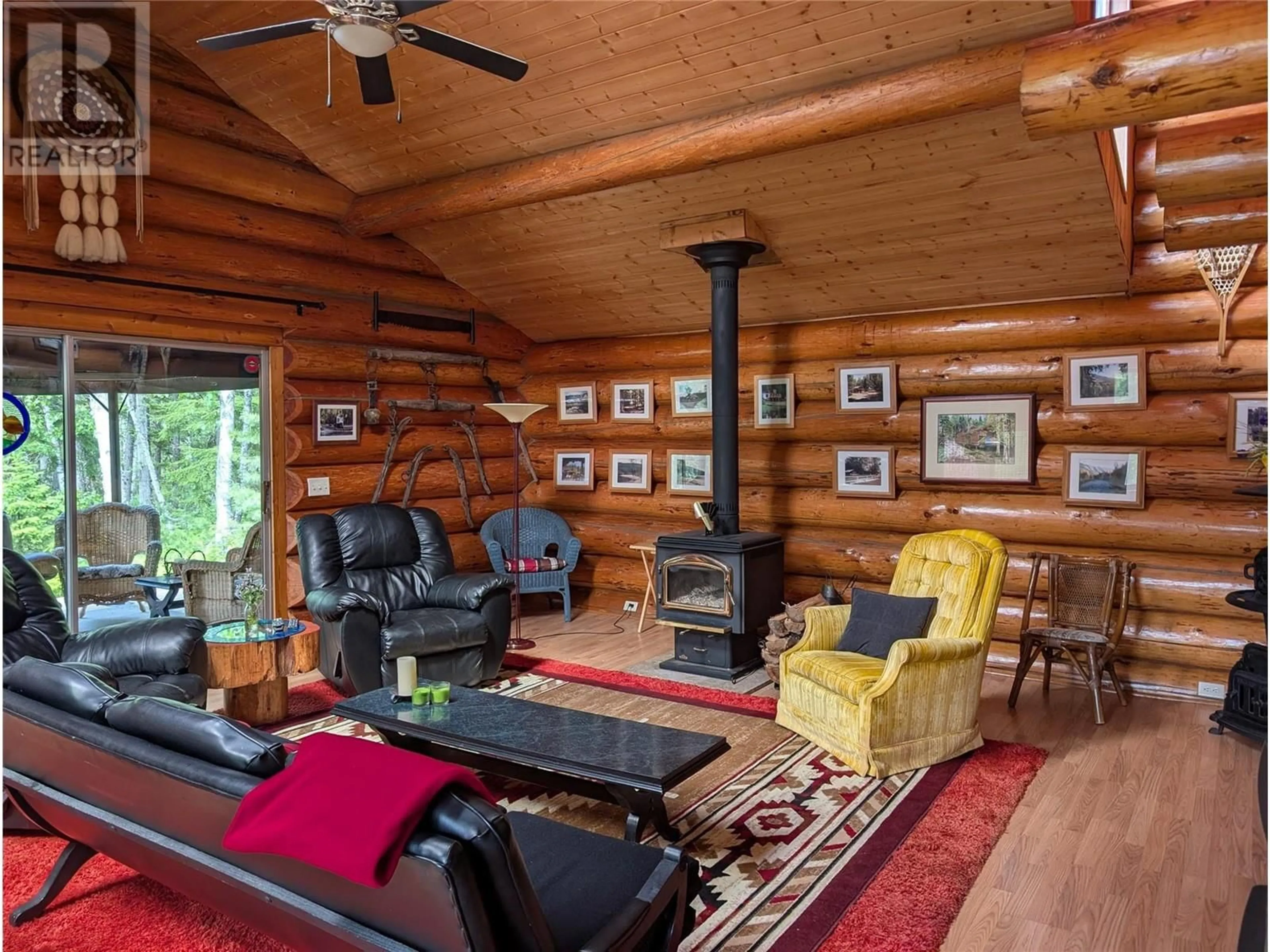 Living room with furniture, wood/laminate floor for 1363 BOURNE CRESCENT, Seymour Arm British Columbia V0E2V2