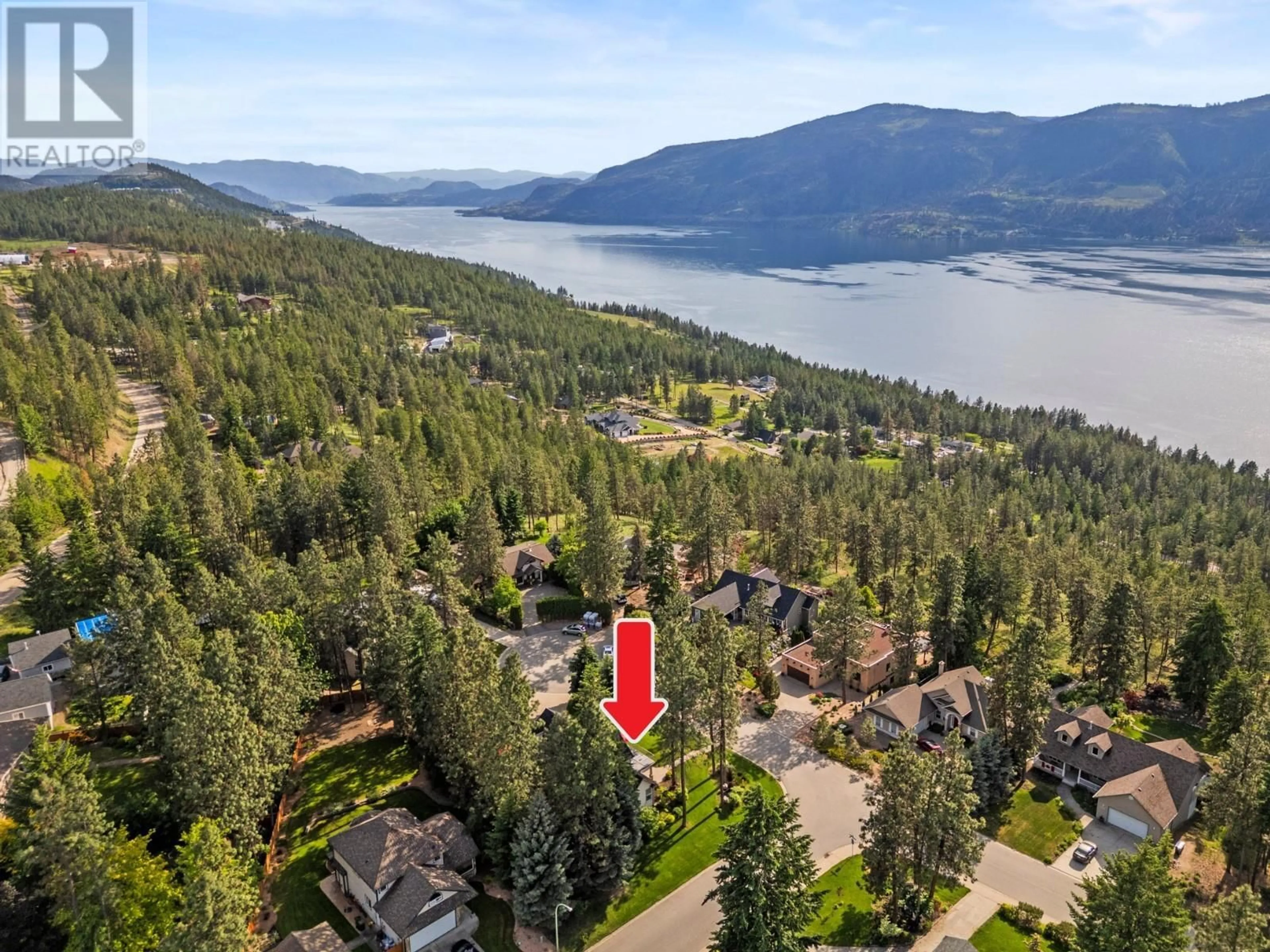 A pic from outside/outdoor area/front of a property/back of a property/a pic from drone, water/lake/river/ocean view for 7229 HERITAGE COURT, Lake Country British Columbia V4V2L3