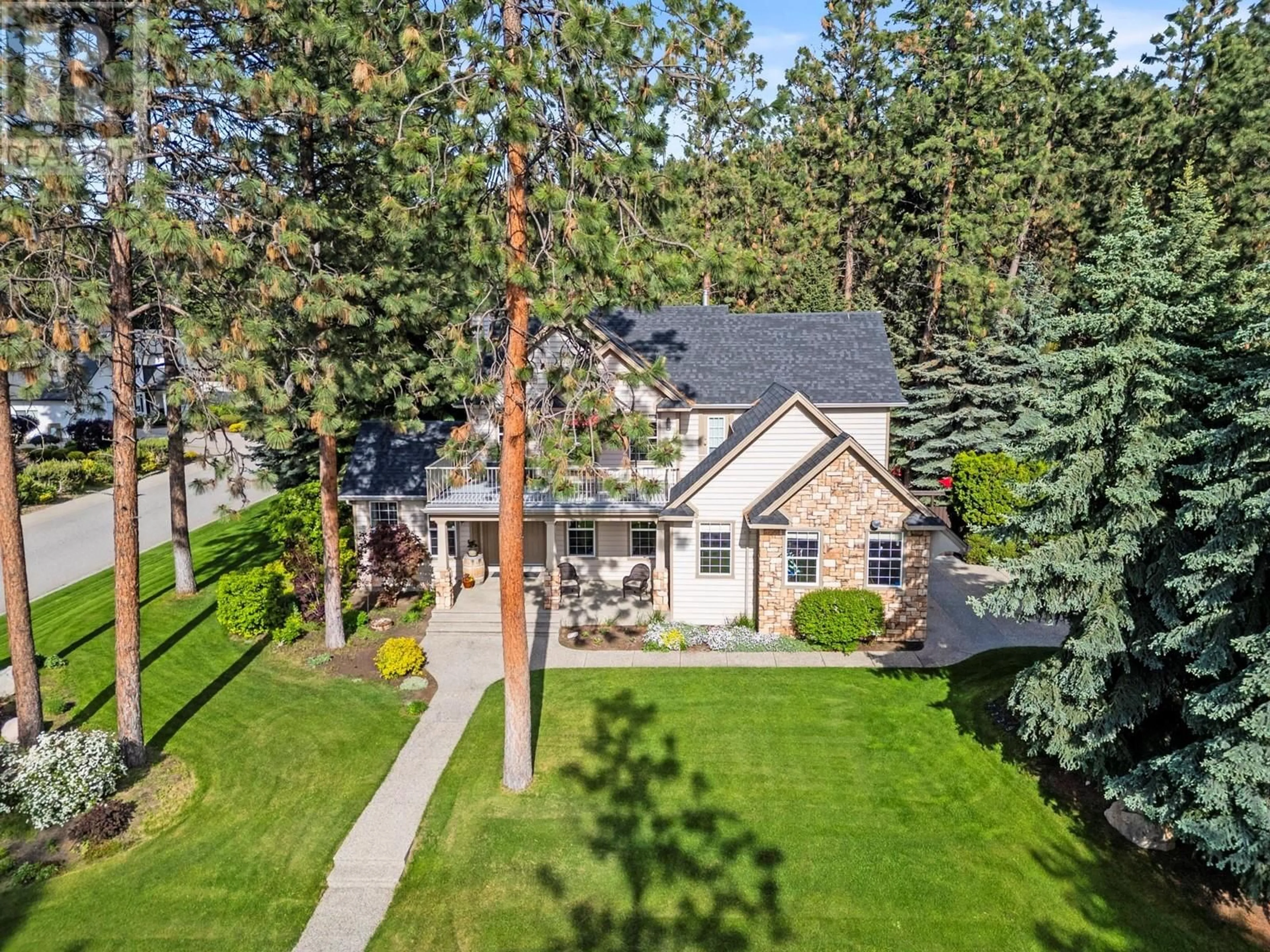 A pic from outside/outdoor area/front of a property/back of a property/a pic from drone, unknown for 7229 HERITAGE COURT, Lake Country British Columbia V4V2L3