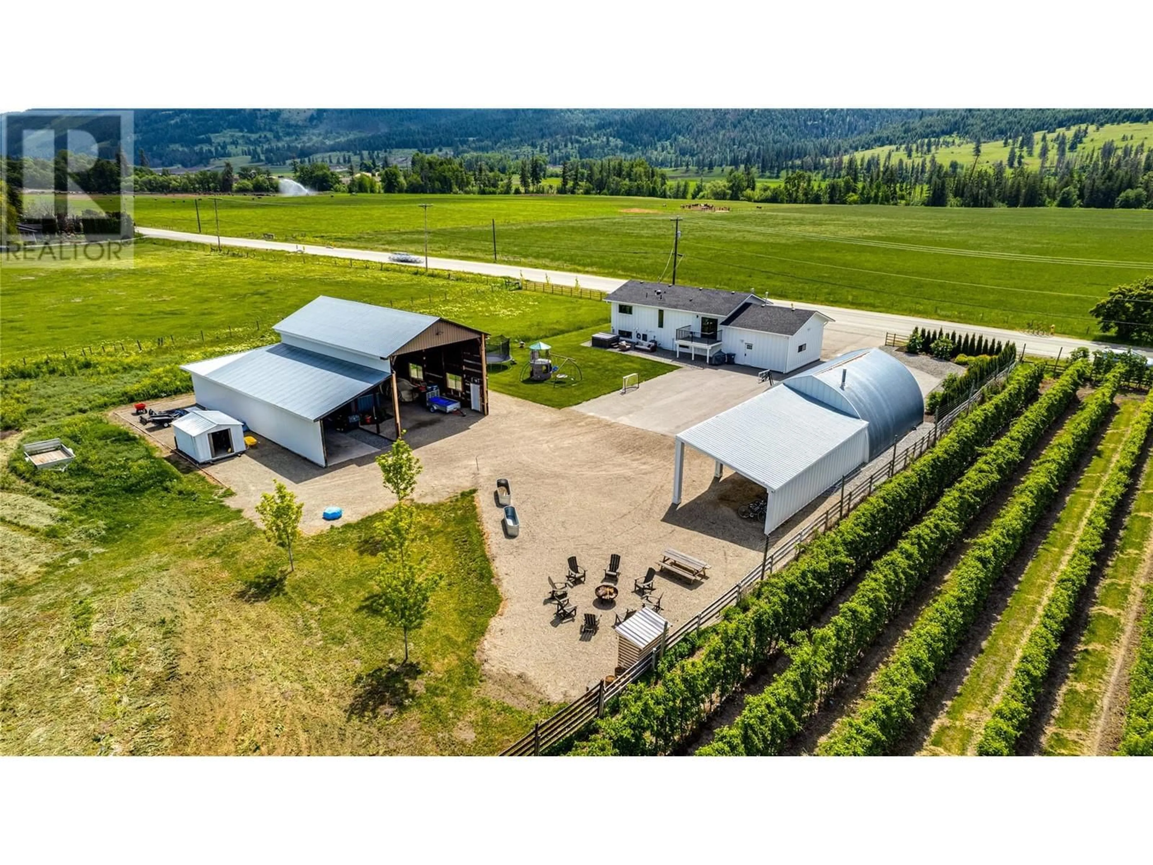 A pic from outside/outdoor area/front of a property/back of a property/a pic from drone, mountain view for 8935 KALAMALKA ROAD, Coldstream British Columbia V1B3C2