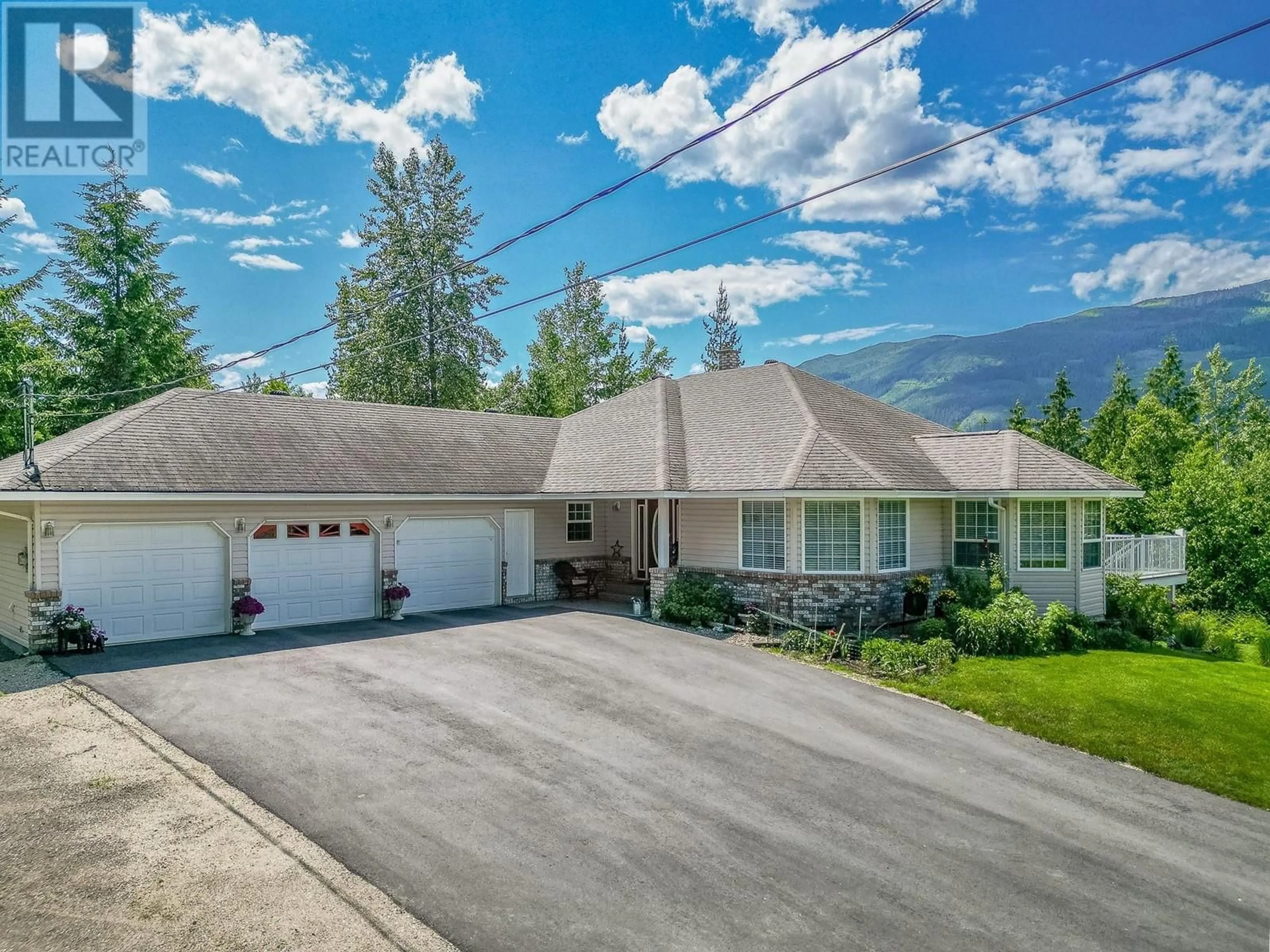 A pic from outside/outdoor area/front of a property/back of a property/a pic from drone, mountain view for 4340 SEDERBERG ROAD, Malakwa British Columbia V0E2J0