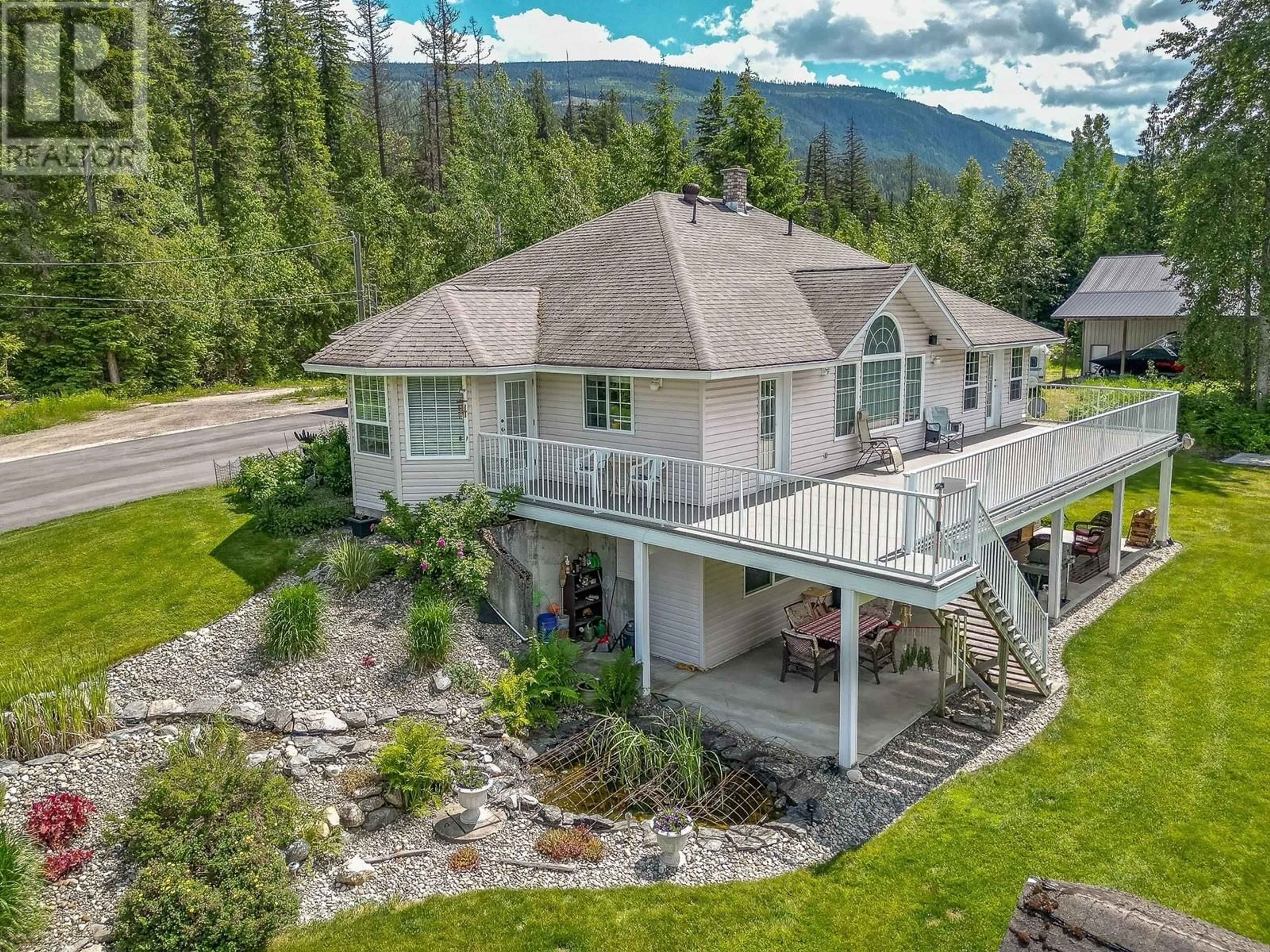 A pic from outside/outdoor area/front of a property/back of a property/a pic from drone, mountain view for 4340 SEDERBERG ROAD, Malakwa British Columbia V0E2J0