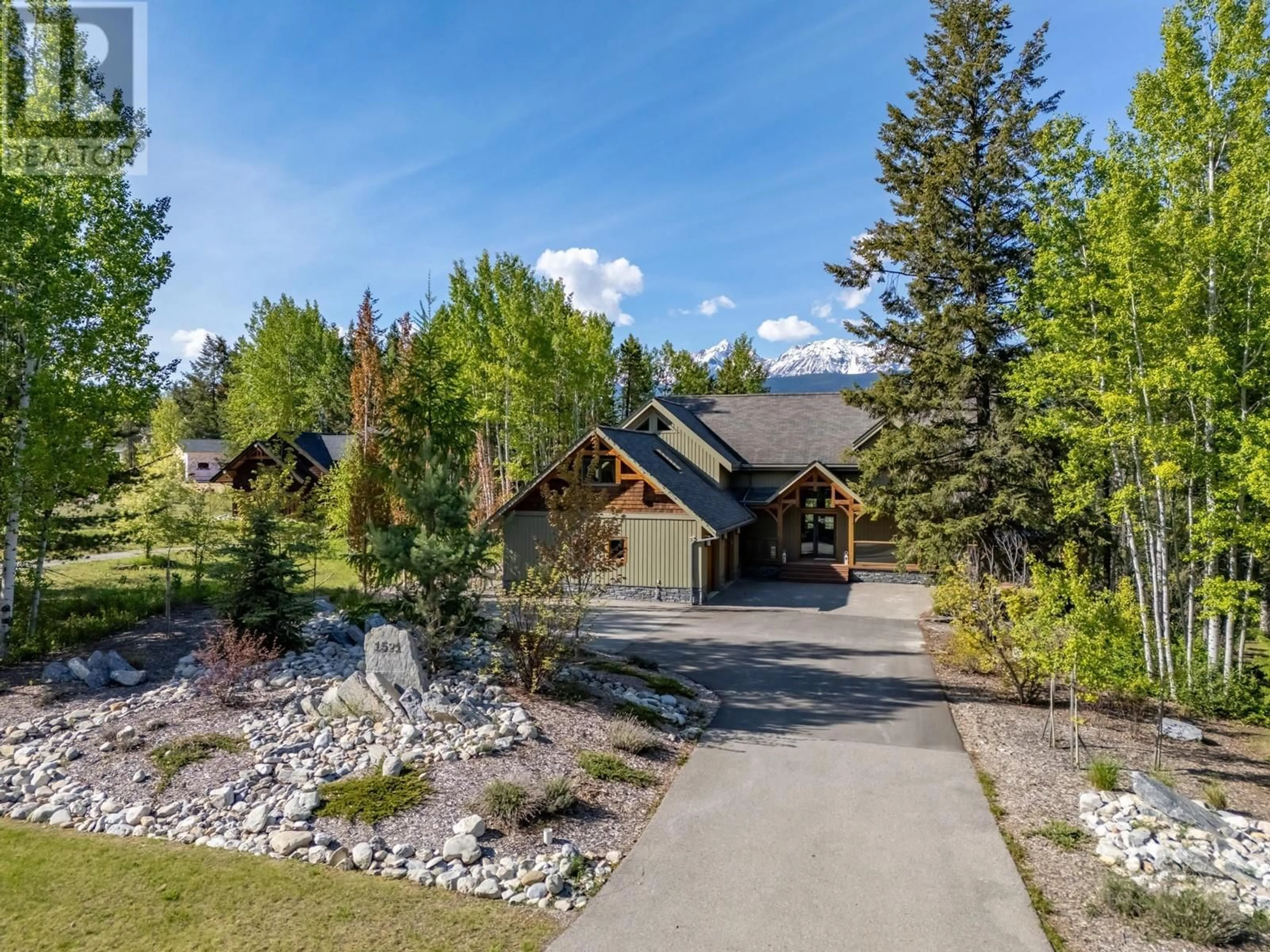 A pic from outside/outdoor area/front of a property/back of a property/a pic from drone, mountain view for 1521 QUARTZ CRESCENT, Golden British Columbia V0A1H3