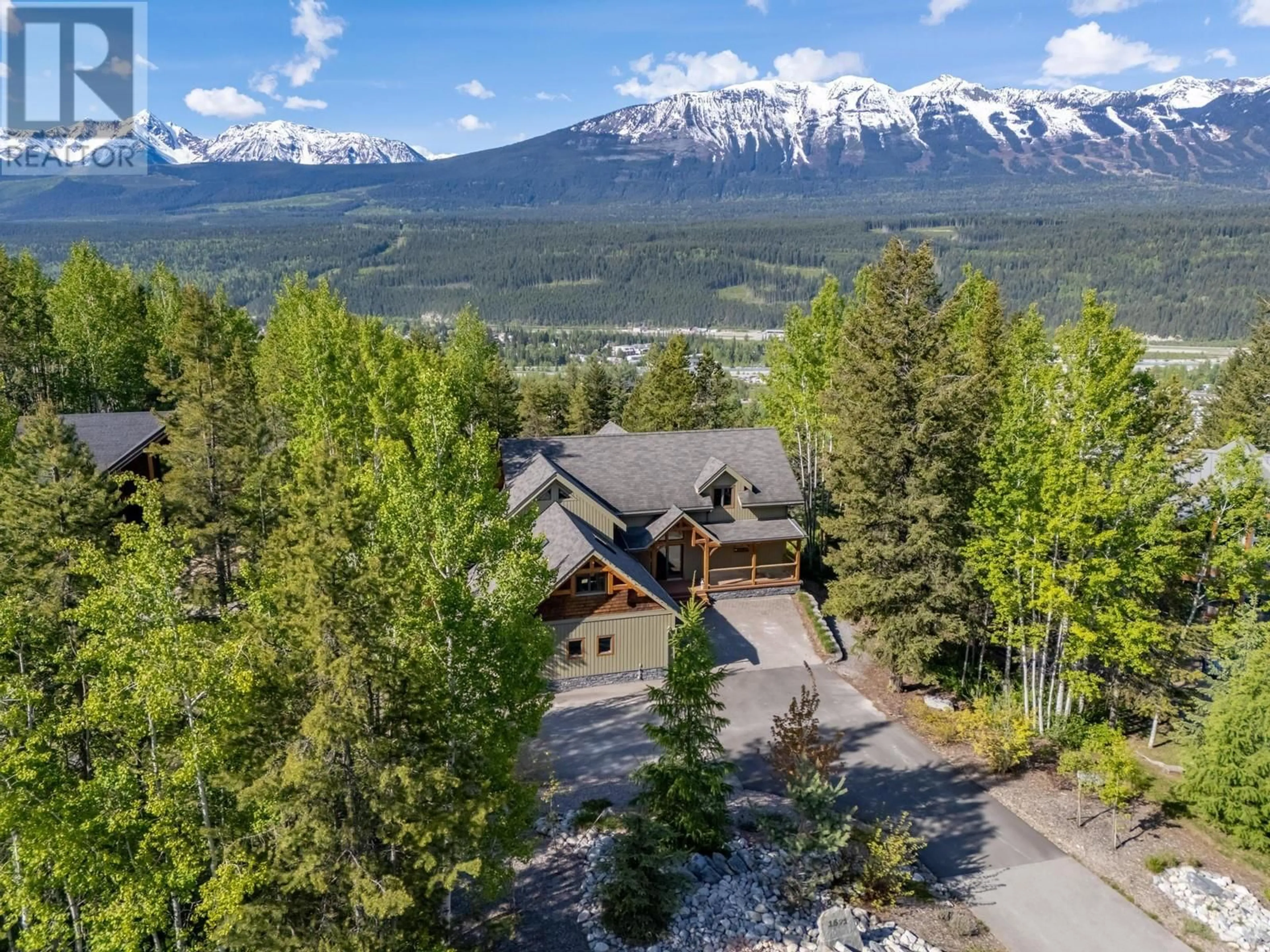 A pic from outside/outdoor area/front of a property/back of a property/a pic from drone, mountain view for 1521 QUARTZ CRESCENT, Golden British Columbia V0A1H3