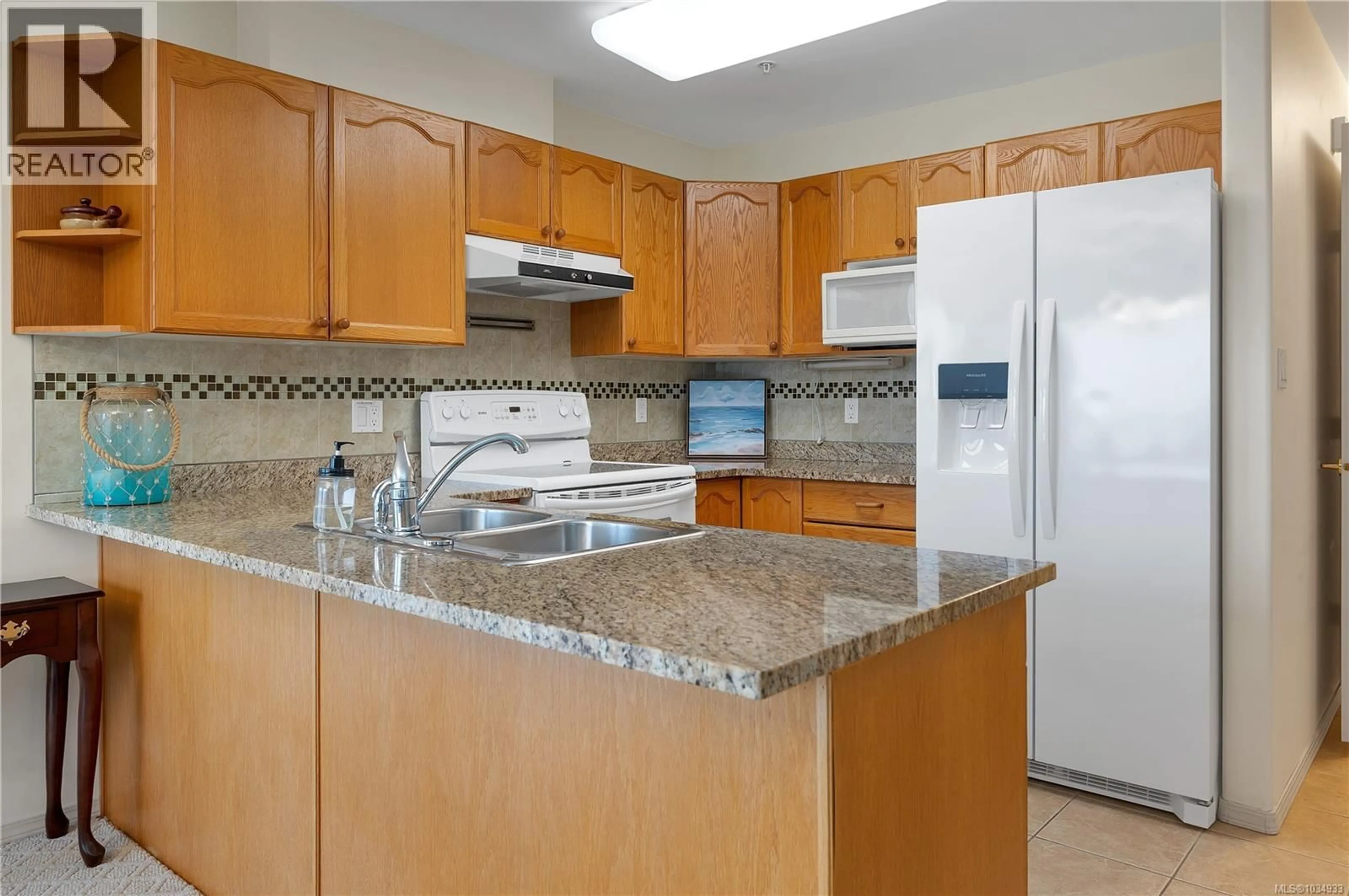 Standard kitchen, ceramic/tile floor for 108 - 1350 ISLAND HIGHWAY SOUTH, Campbell River British Columbia V9W1B5
