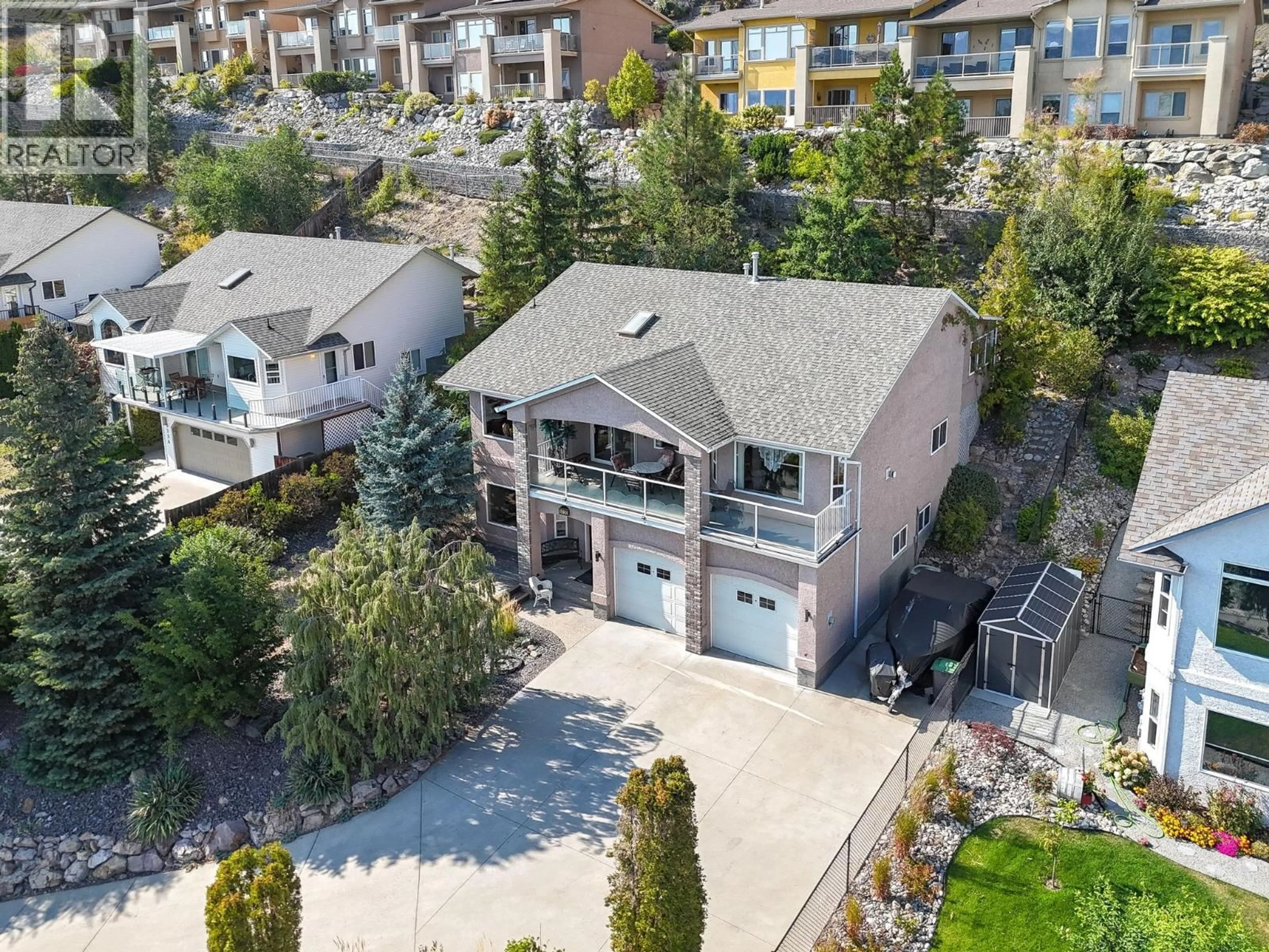 A pic from outside/outdoor area/front of a property/back of a property/a pic from drone, street for 5220 SUTHERLAND ROAD, Peachland British Columbia V0H1X0