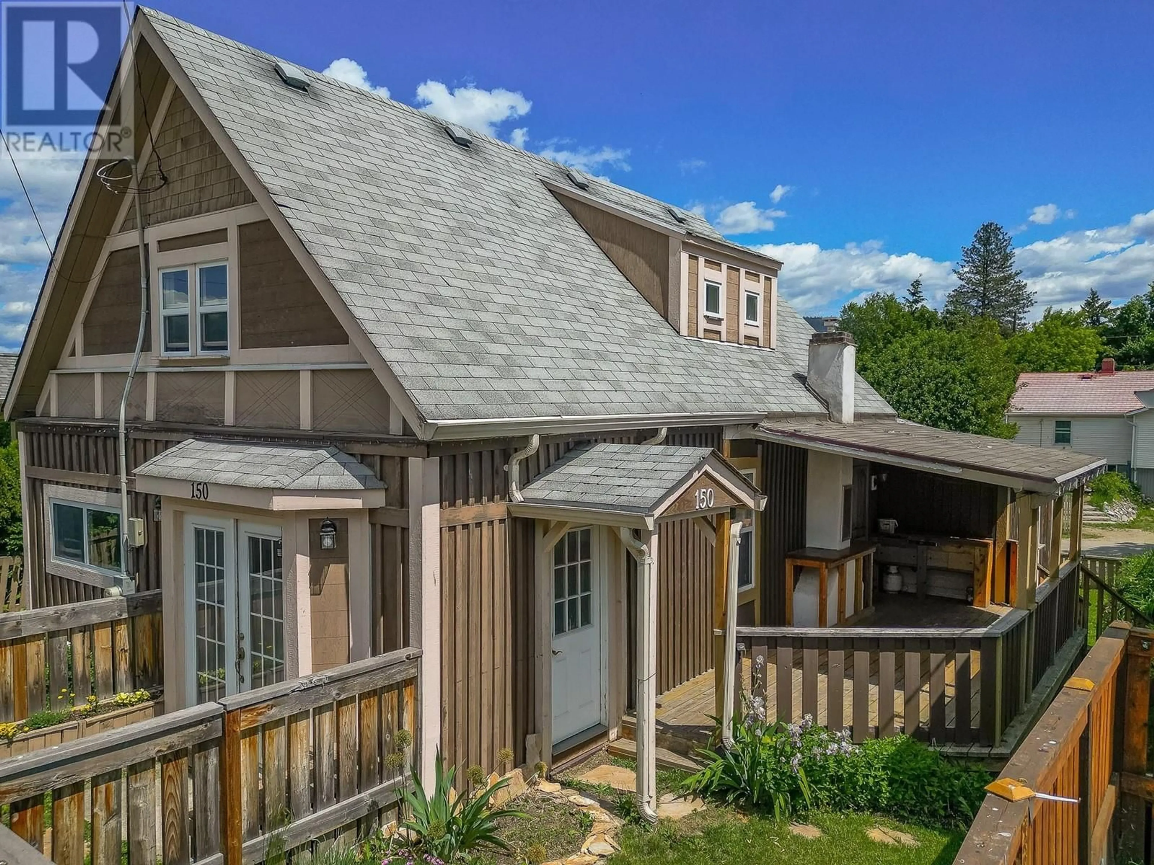 A pic from outside/outdoor area/front of a property/back of a property/a pic from drone, unknown for 150 1 STREET SOUTHEAST, Salmon Arm British Columbia V1E4H5