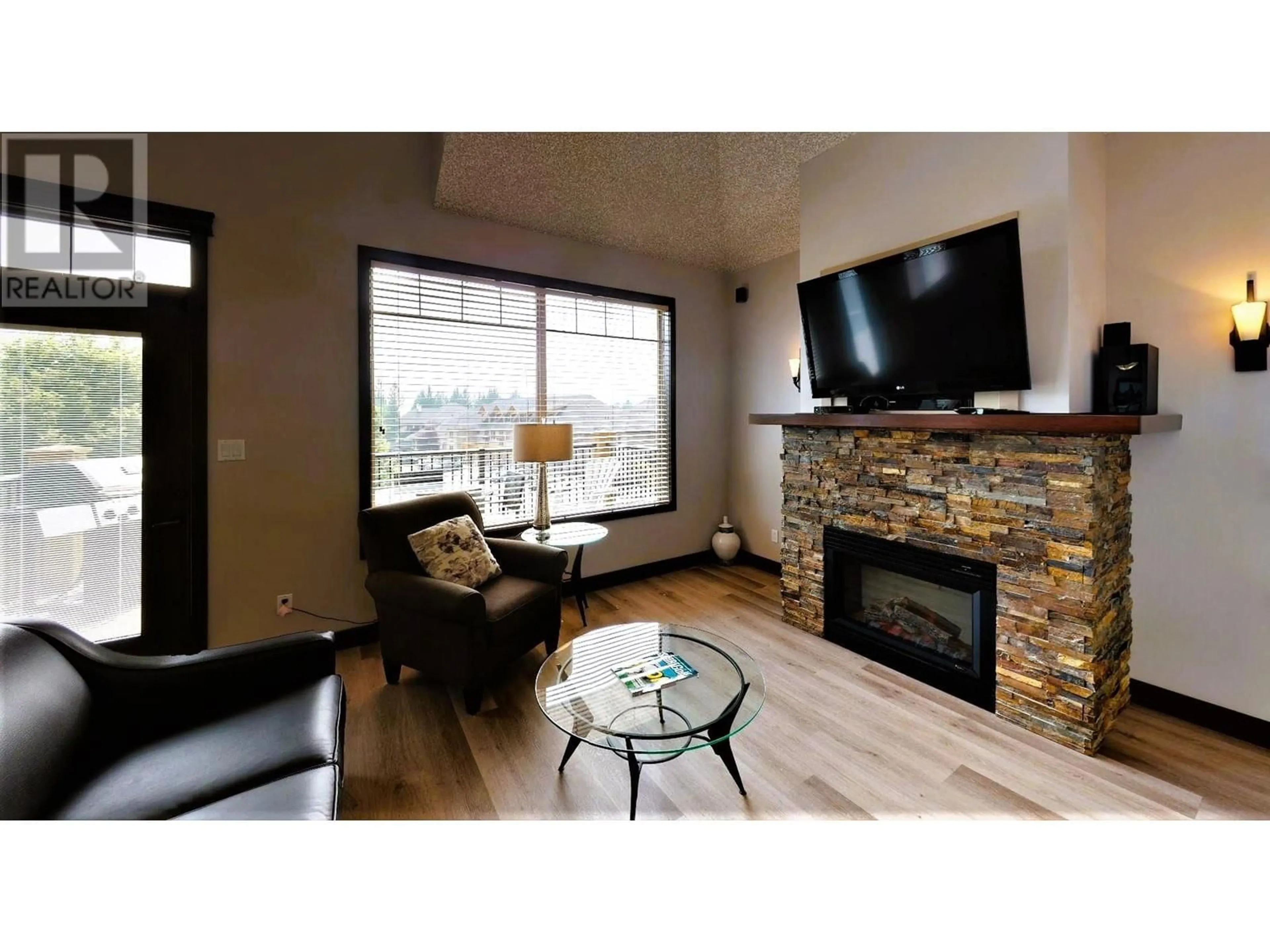Living room with furniture, wood/laminate floor for 534 C - 500 BIGHORN BOULEVARD, Radium Hot Springs British Columbia V0A1M0