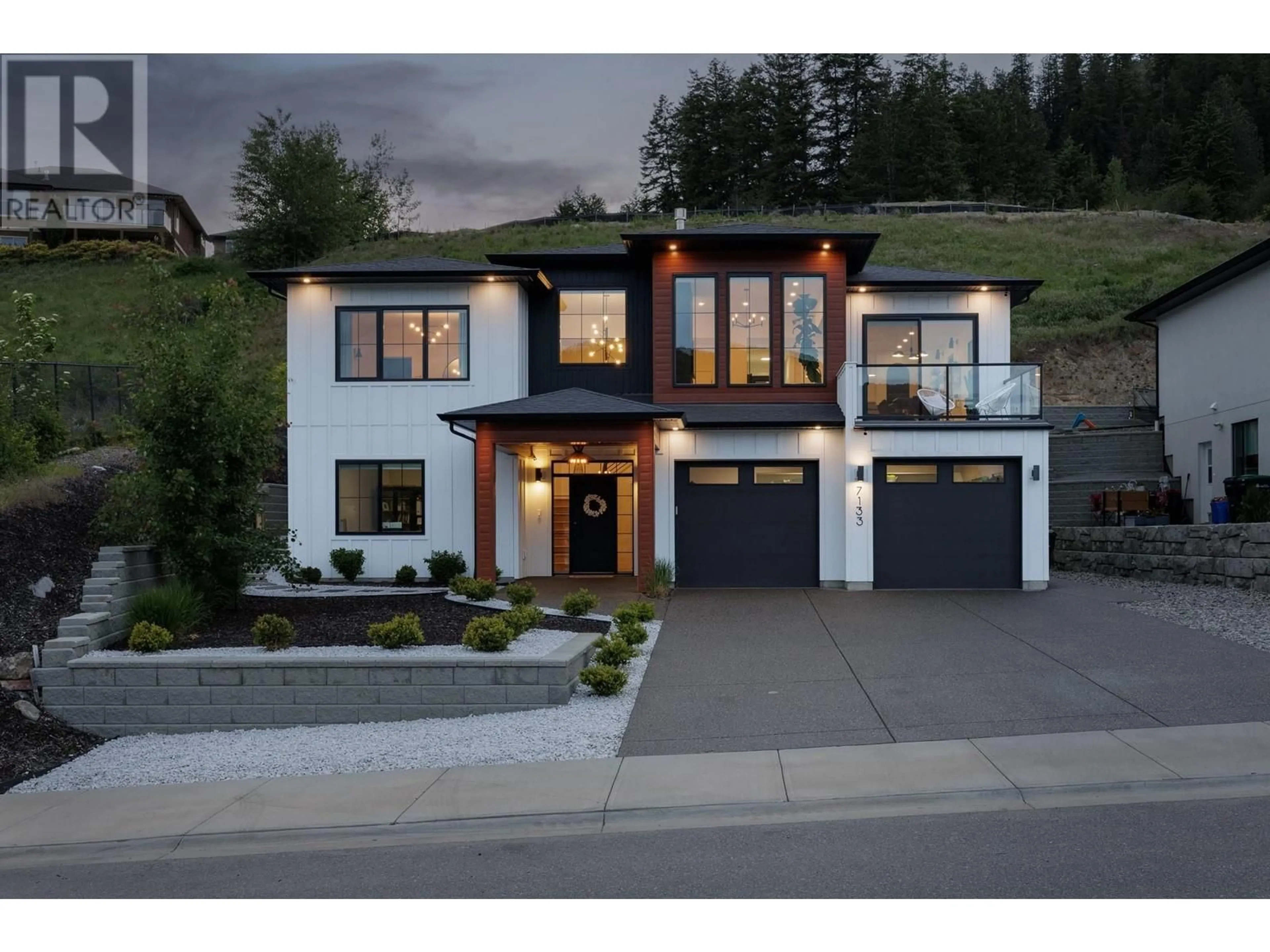 Home with brick exterior material, street for 7133 NAKISKA DRIVE, Vernon British Columbia V1B3M5