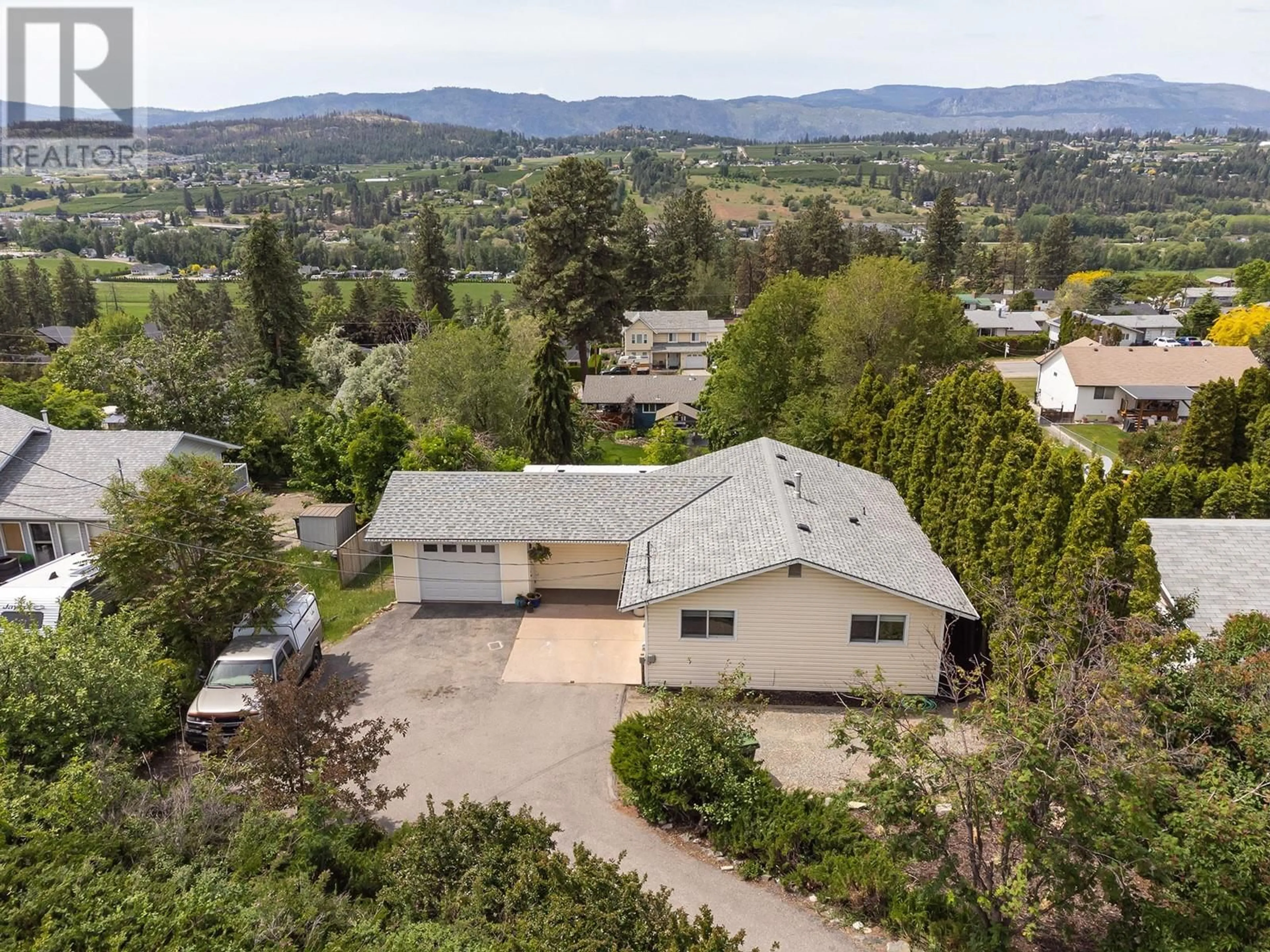 A pic from outside/outdoor area/front of a property/back of a property/a pic from drone, mountain view for 10556 CHERYL ROAD, Lake Country British Columbia V4V1W3