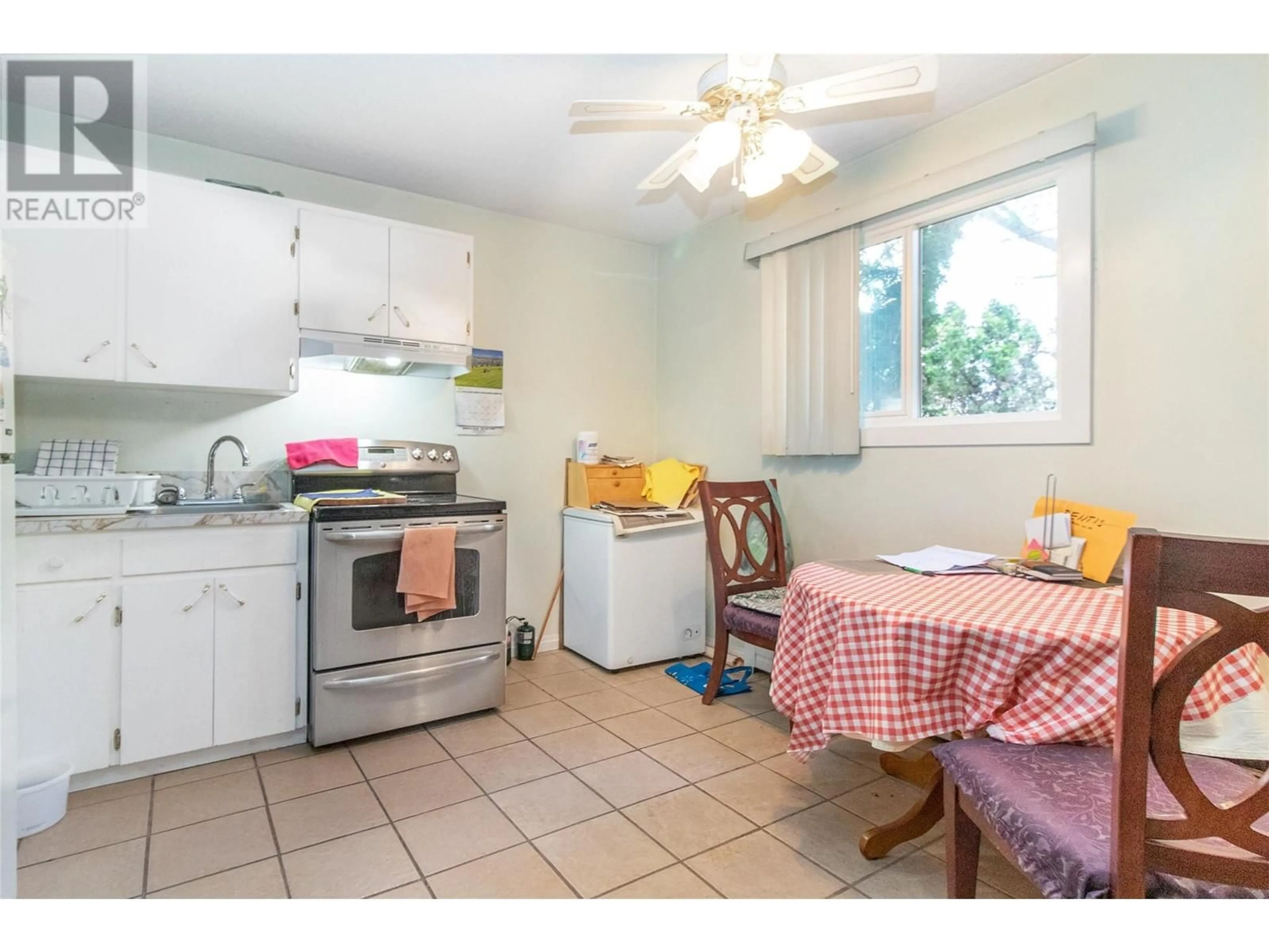 Standard kitchen, ceramic/tile floor for 103 - 150 SCARBORO ROAD, Kelowna British Columbia V1X1M2