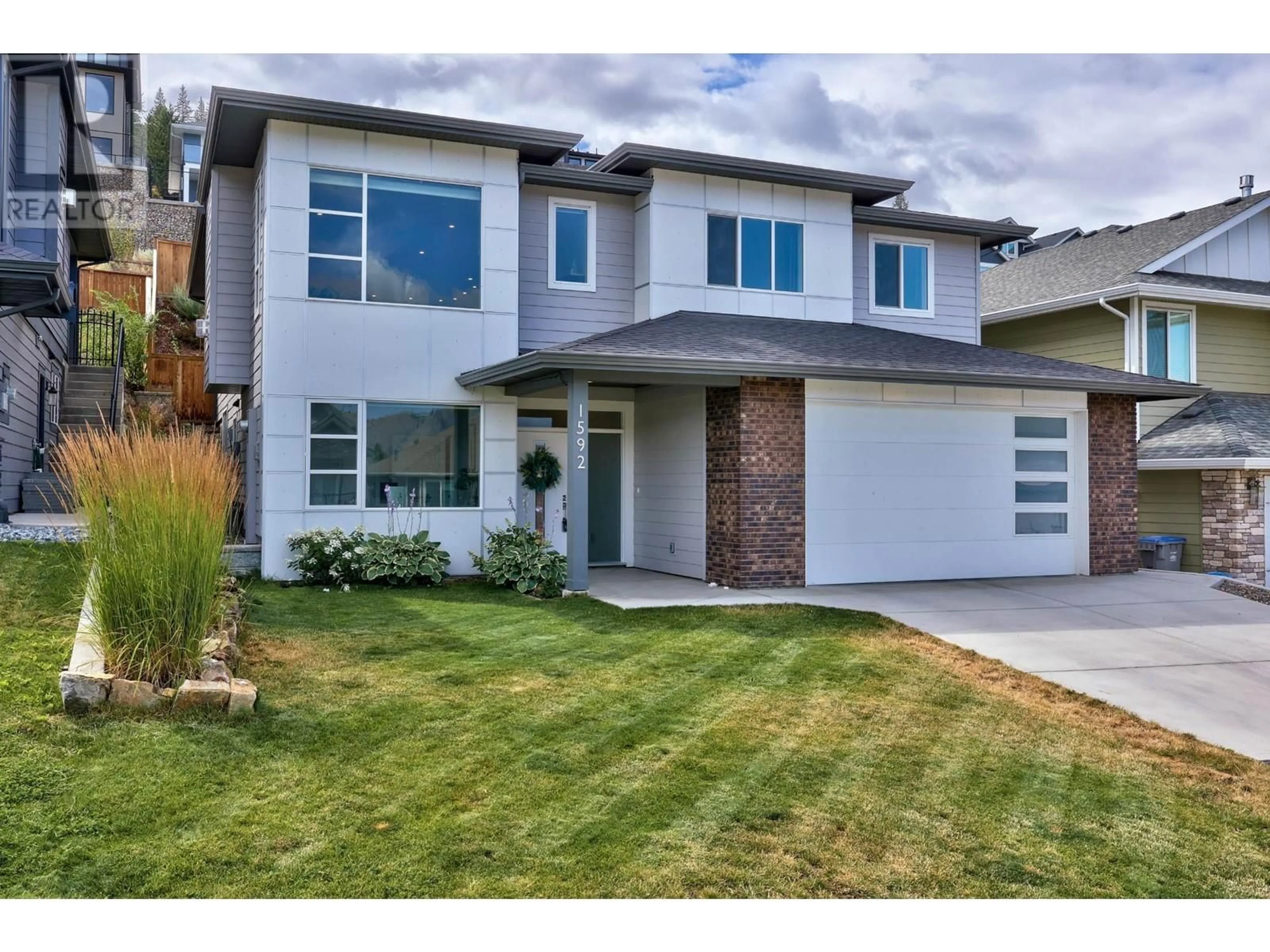 Home with brick exterior material, street for 1592 EMERALD DRIVE, Kamloops British Columbia V2E0C4