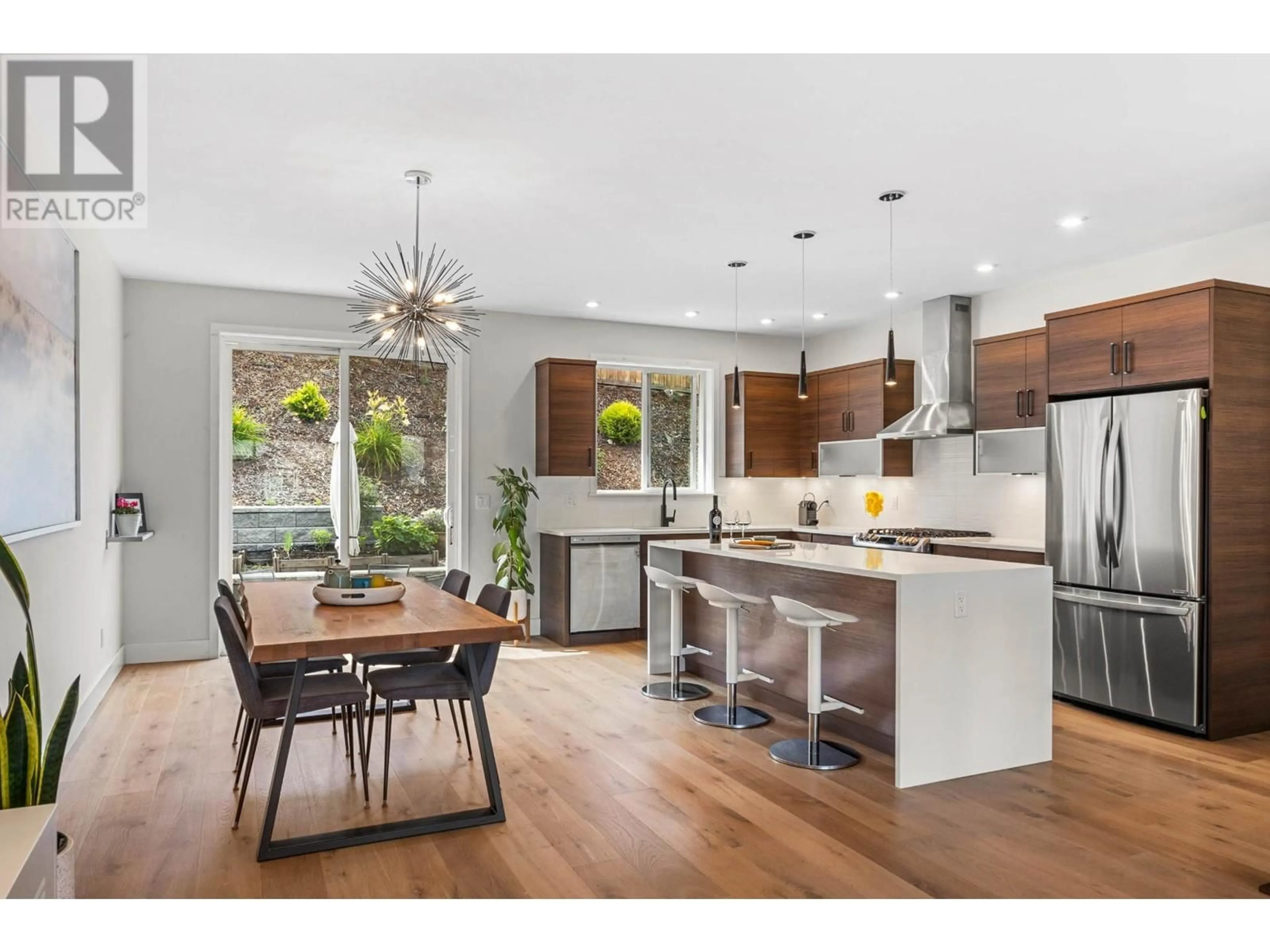 Open concept kitchen, wood/laminate floor for 1592 EMERALD DRIVE, Kamloops British Columbia V2E0C4