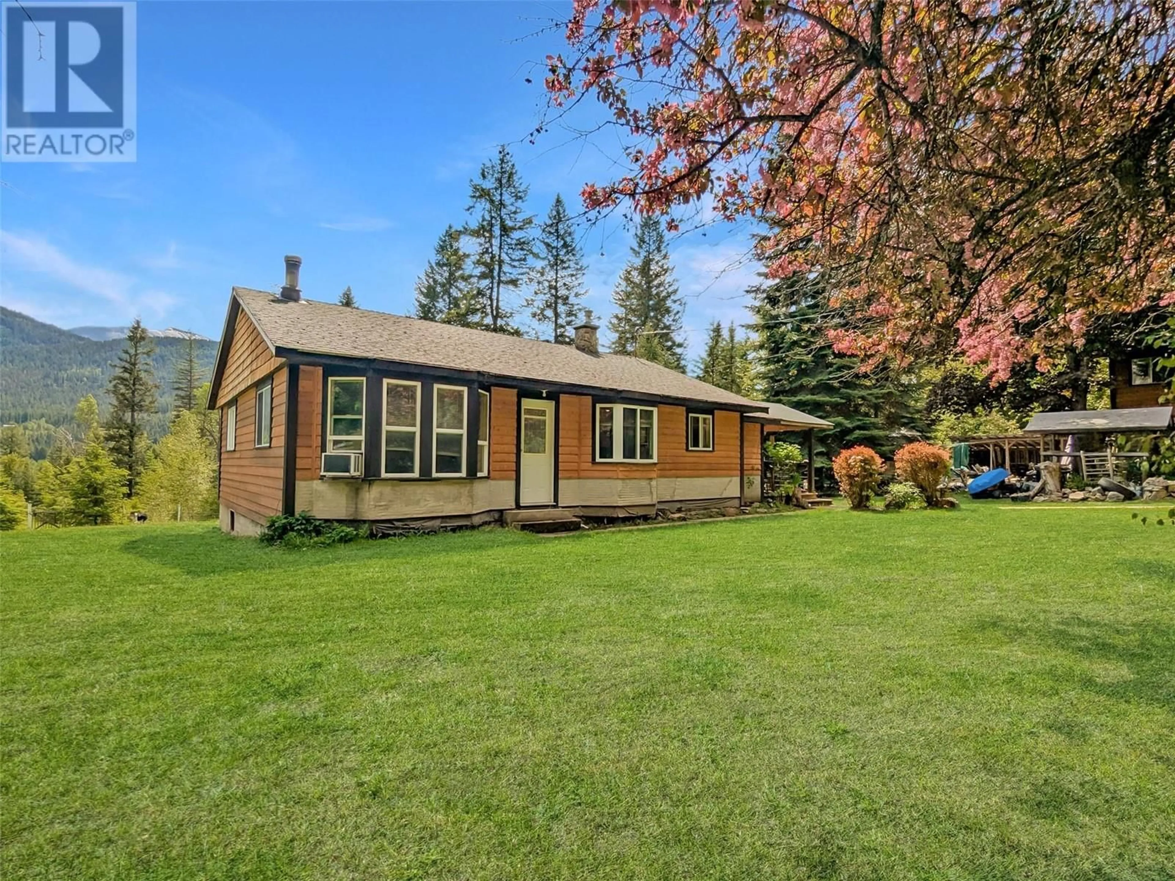 Home with vinyl exterior material, street for 6680 PERRY'S BACK ROAD ROAD, Winlaw British Columbia V0G2J0