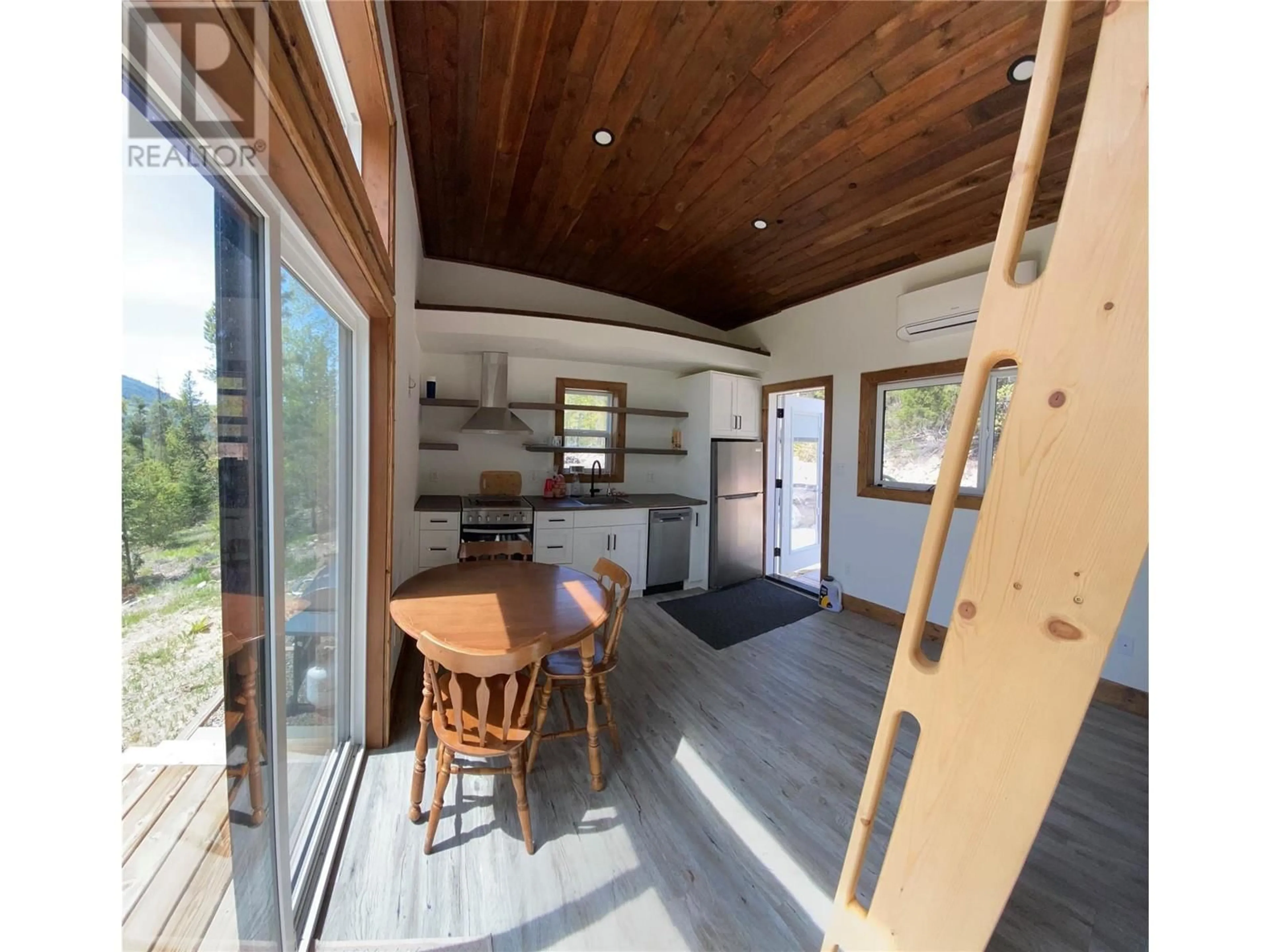 Open concept kitchen, wood/laminate floor for 3834 PRINCETON-SUMMERLAND ROAD, Princeton British Columbia V0X1W0
