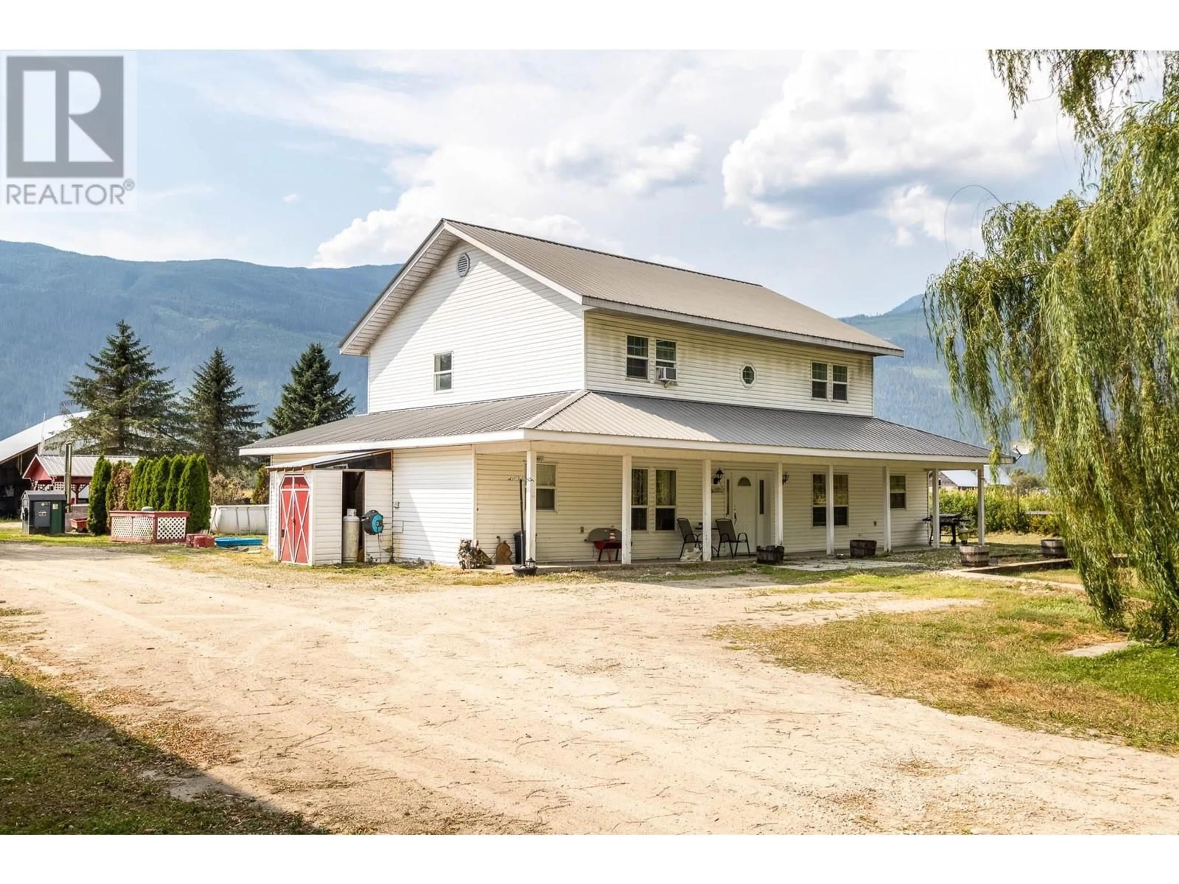 A pic from outside/outdoor area/front of a property/back of a property/a pic from drone, mountain view for 3695 MALAKWA LOOP ROAD, Malakwa British Columbia V0E2J0