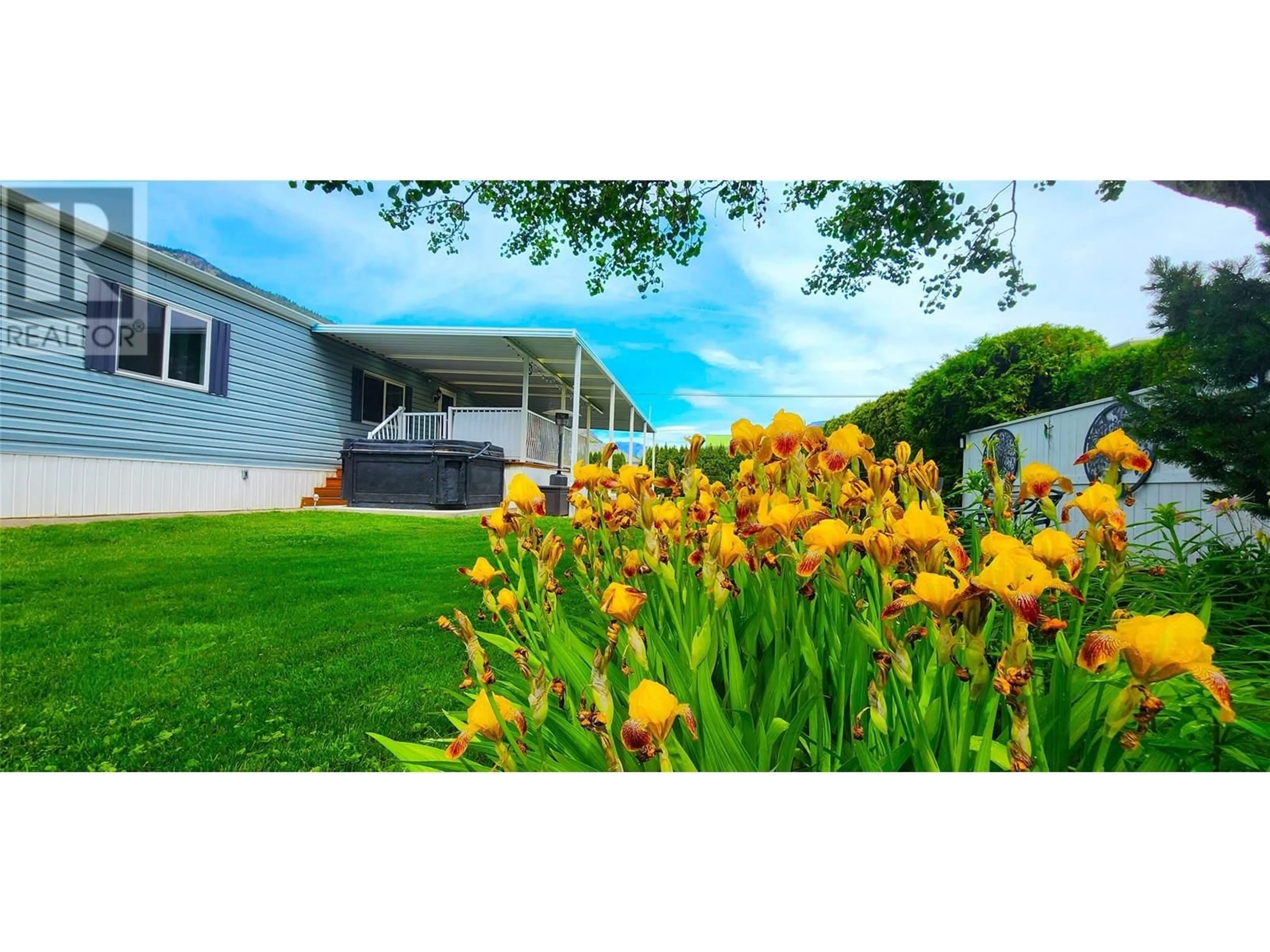A pic from outside/outdoor area/front of a property/back of a property/a pic from drone, unknown for 715 10TH AVENUE, Keremeos British Columbia V0X1N3