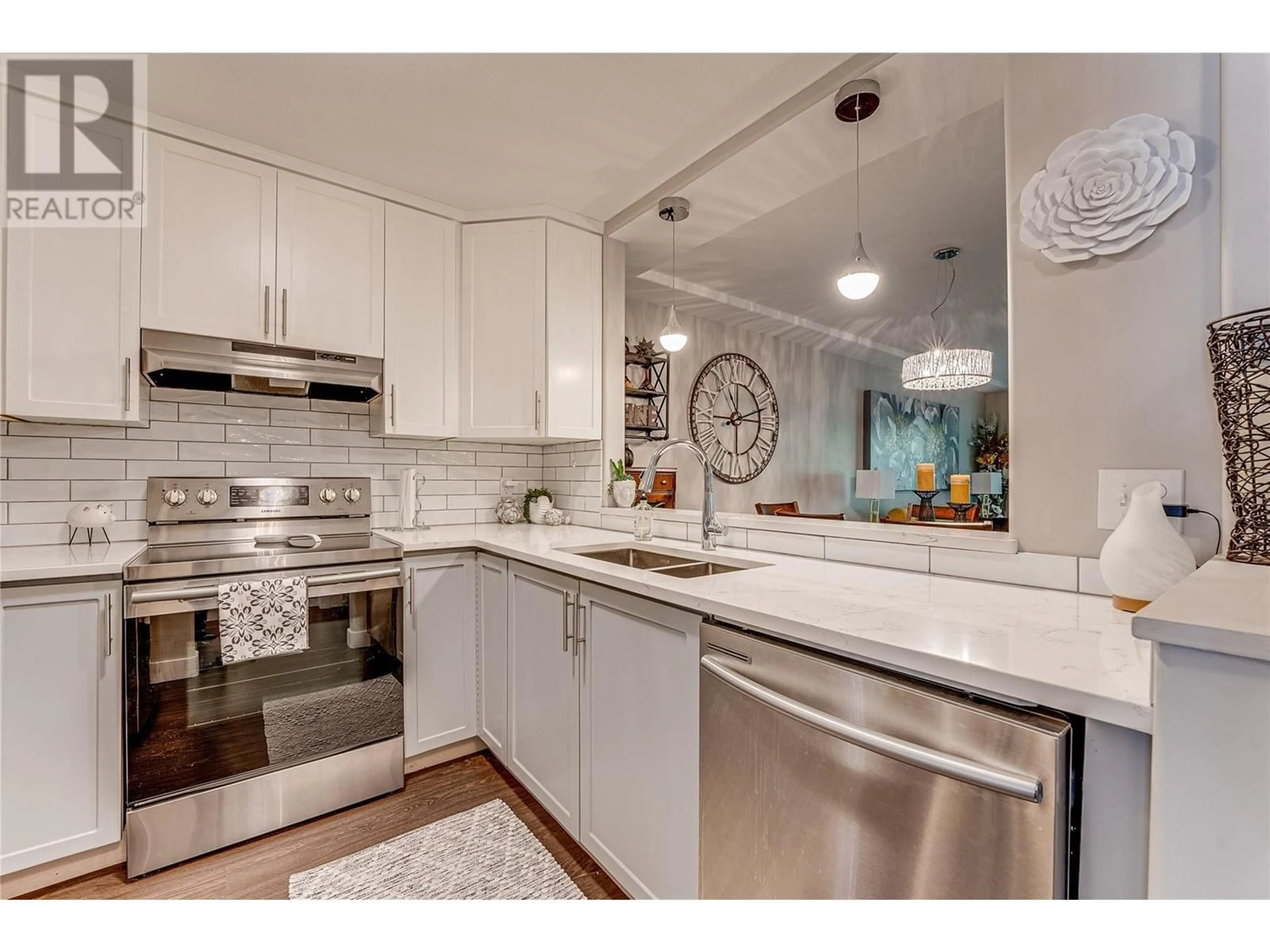 Open concept kitchen, ceramic/tile floor for 207 - 204 KALAMALKA LAKE ROAD, Vernon British Columbia V1T7M3