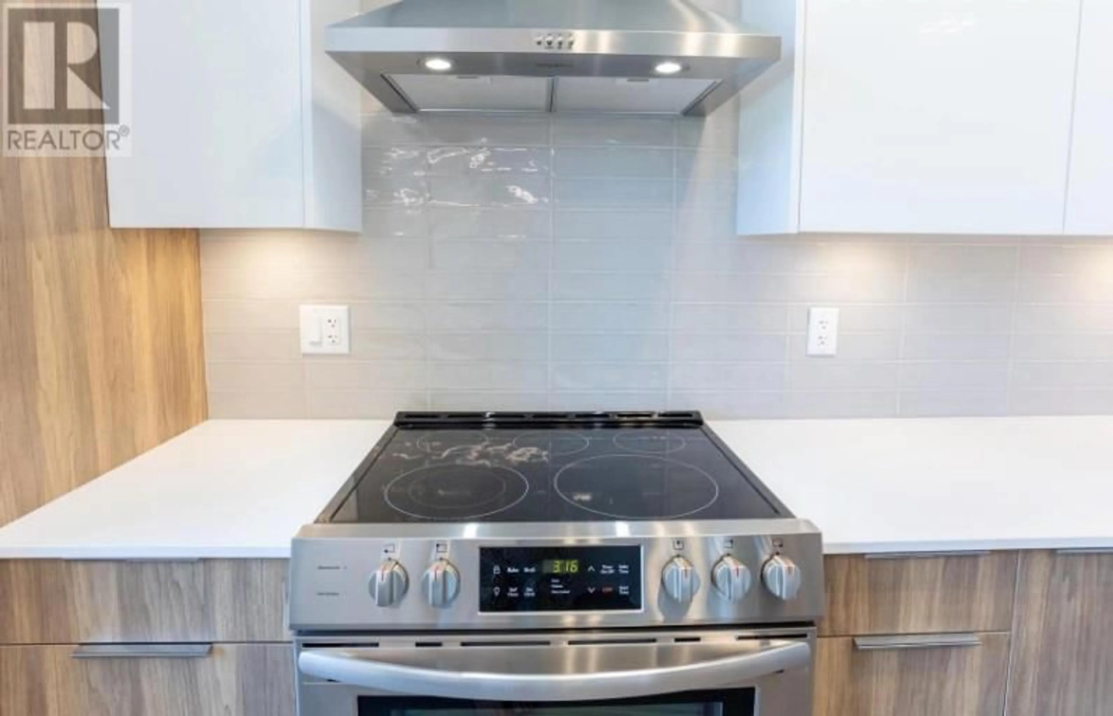 Contemporary kitchen, ceramic/tile floor for 303 - 3642 MISSION SPRINGS DRIVE, Kelowna British Columbia V1W0E1