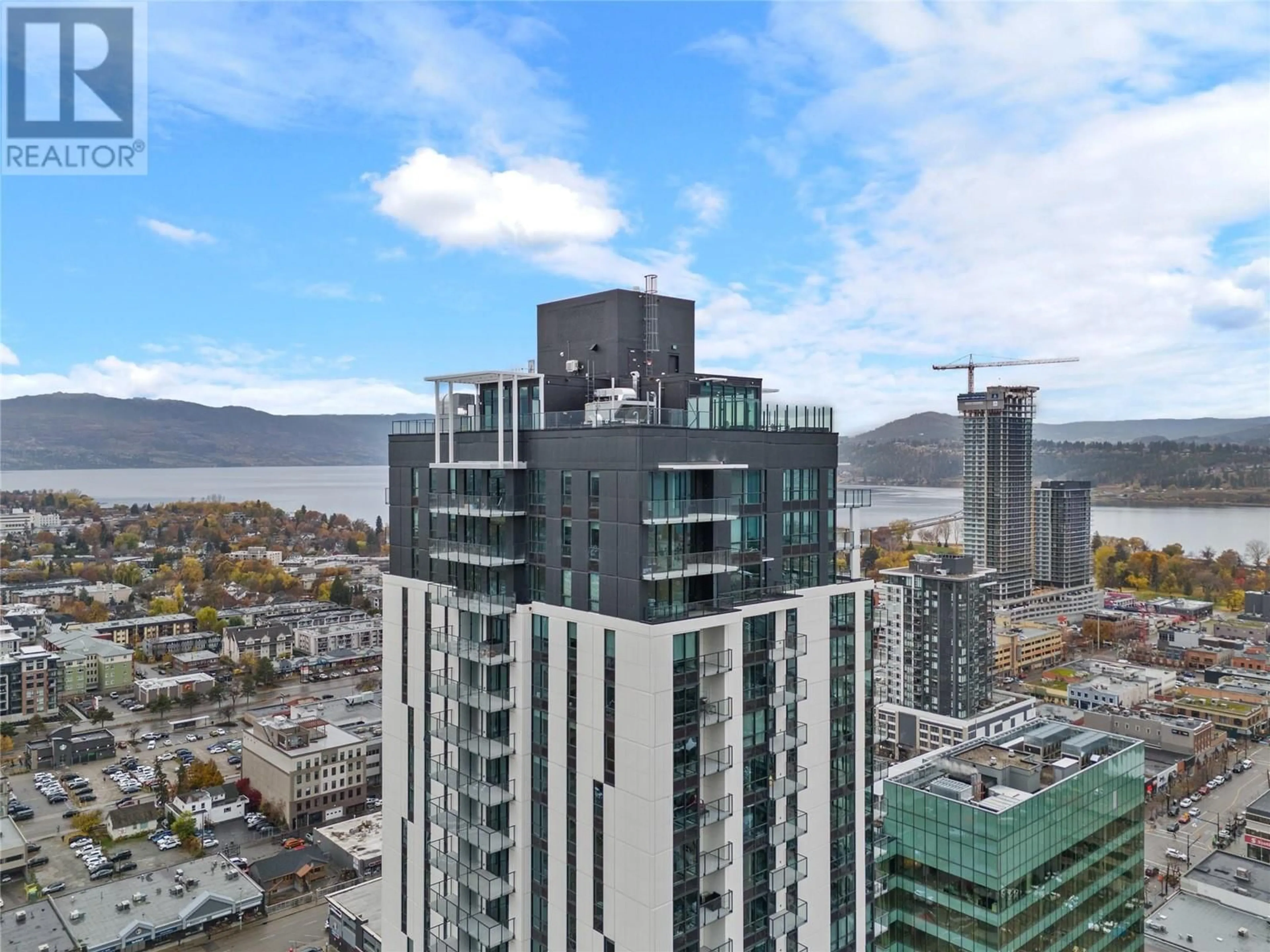 A pic from outside/outdoor area/front of a property/back of a property/a pic from drone, city buildings view from balcony for 3306 - 1488 BERTRAM STREET, Kelowna British Columbia V1Y0M6