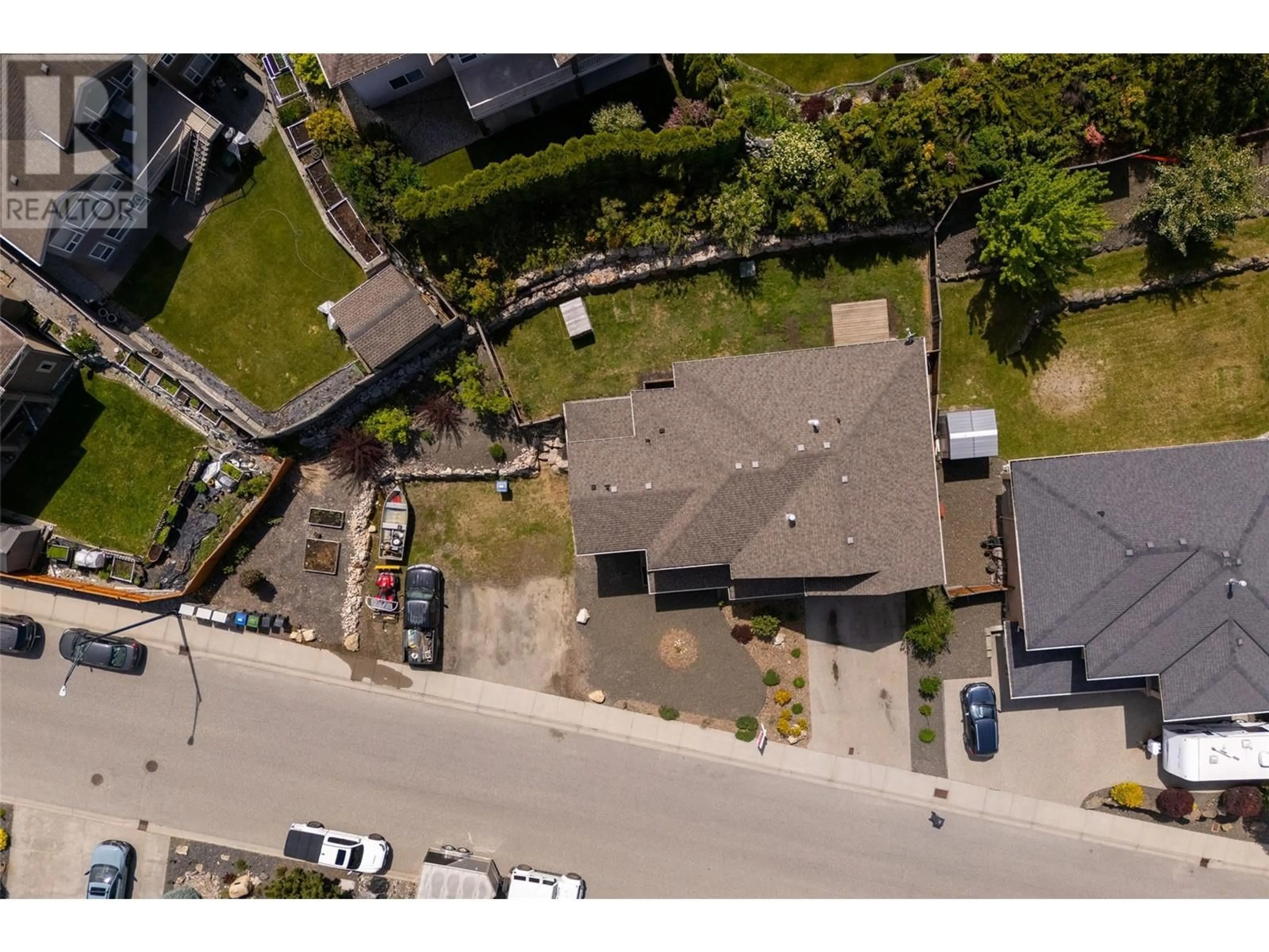 A pic from outside/outdoor area/front of a property/back of a property/a pic from drone, street for 1595 KLOPPENBURG ROAD, Kelowna British Columbia V1P1N5