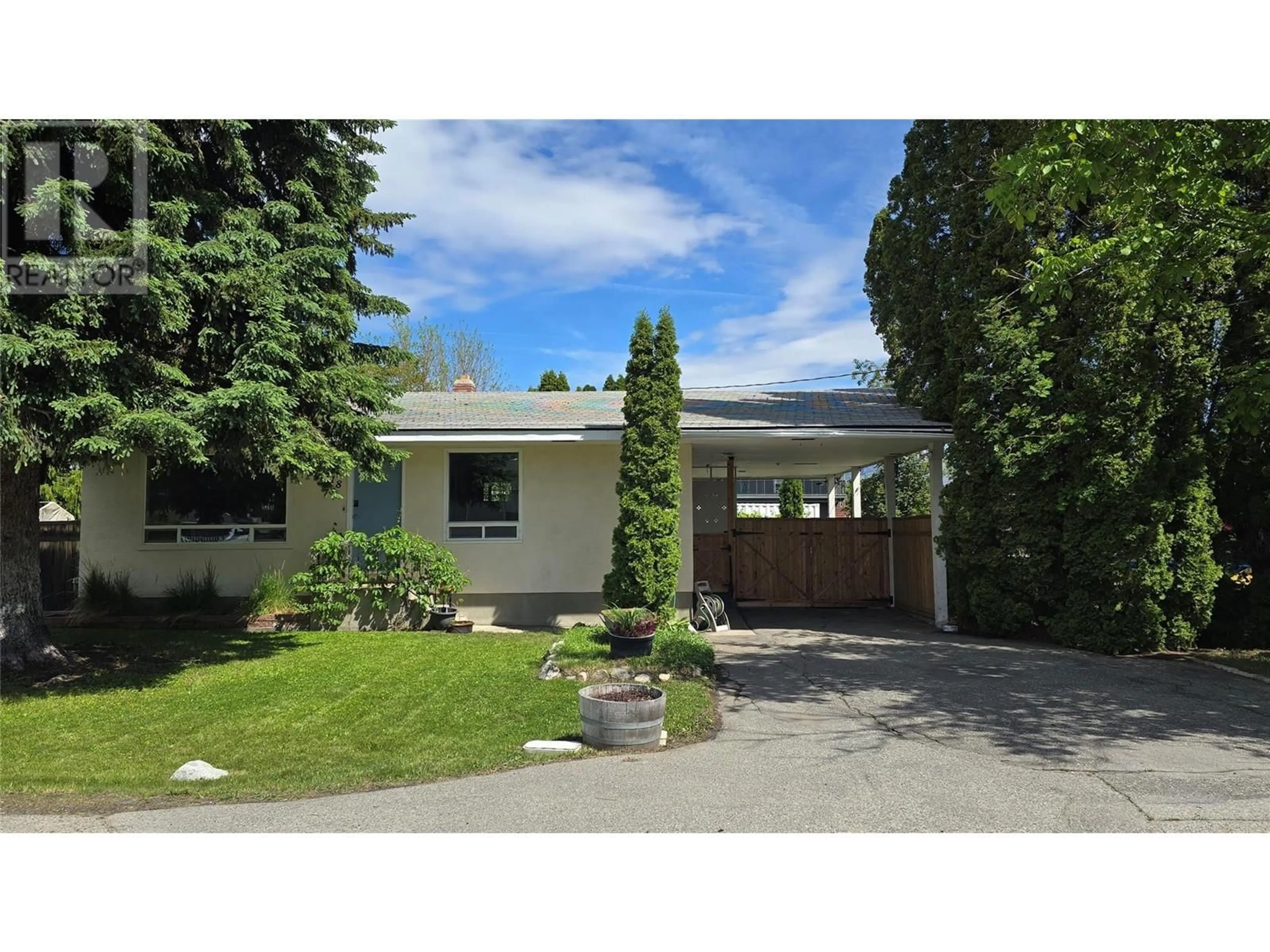 A pic from outside/outdoor area/front of a property/back of a property/a pic from drone, street for 9718 QUINPOOL ROAD, Summerland British Columbia V0H1Z0