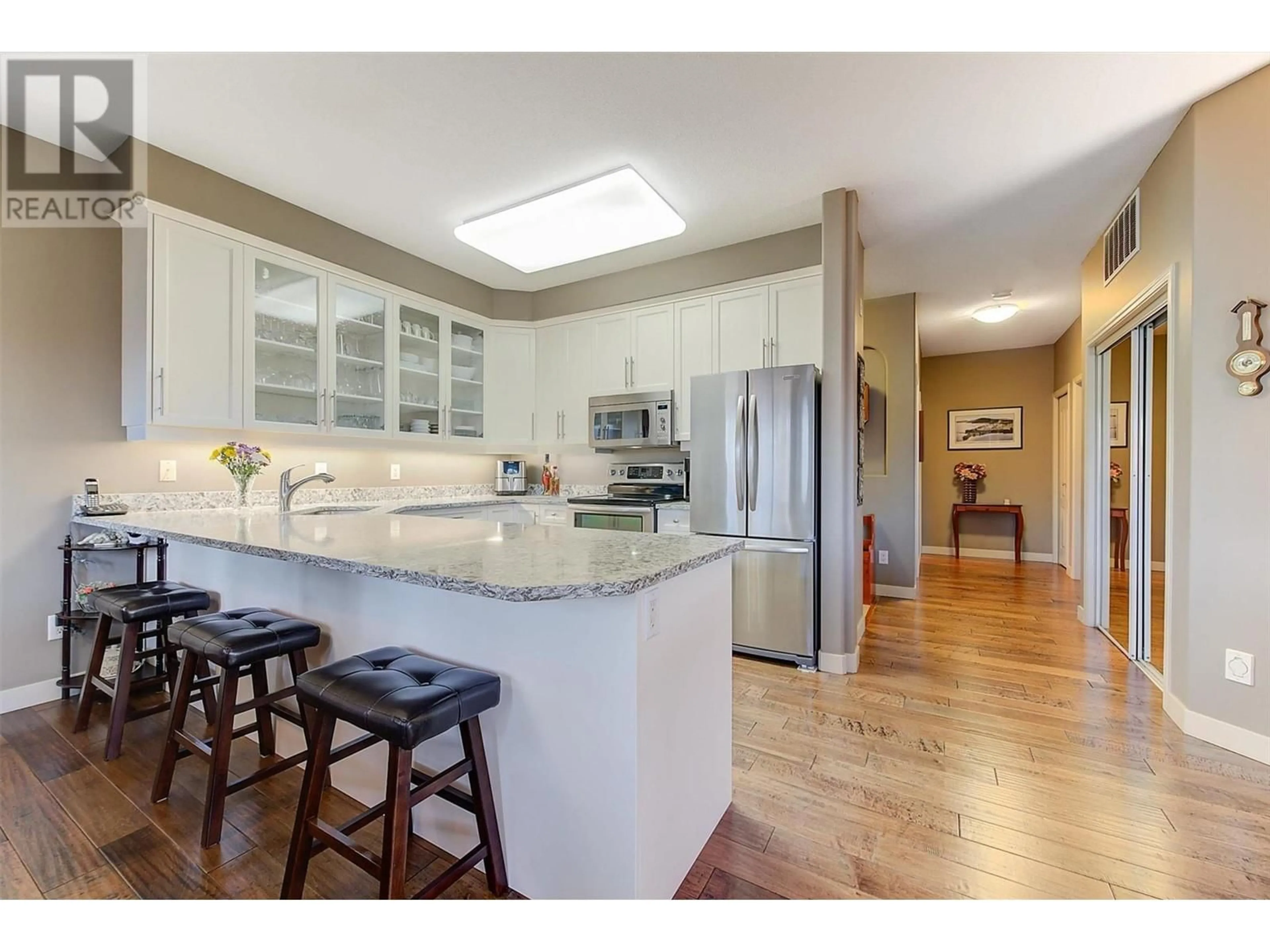 Open concept kitchen, unknown for 102 - 2300 BENVOULIN ROAD, Kelowna British Columbia V1W2C6