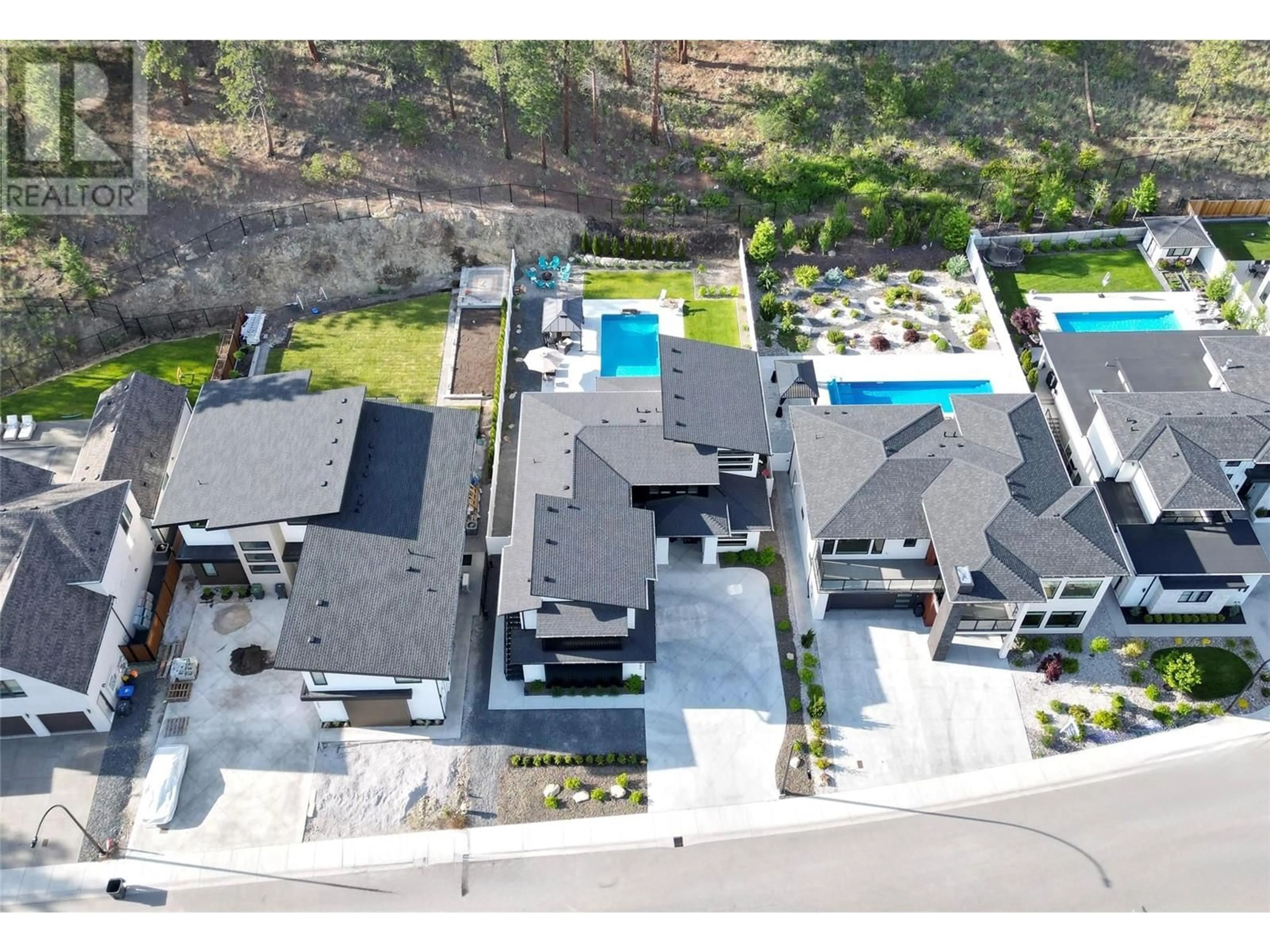 A pic from outside/outdoor area/front of a property/back of a property/a pic from drone, mountain view for 1584 MALBEC PLACE, West Kelowna British Columbia V4T3B5