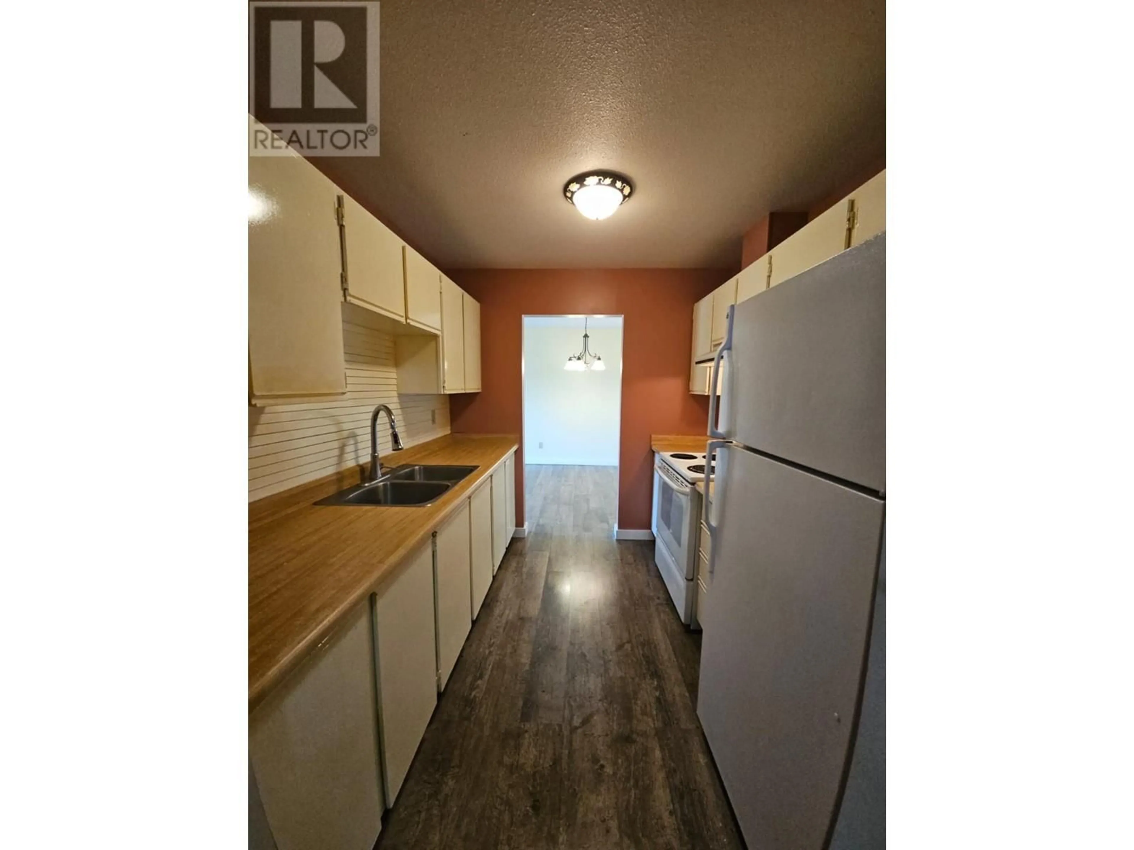 Standard kitchen, wood/laminate floor for 301 - 195 CHAMBERLAIN CRESCENT, Tumbler Ridge British Columbia V0C2W0