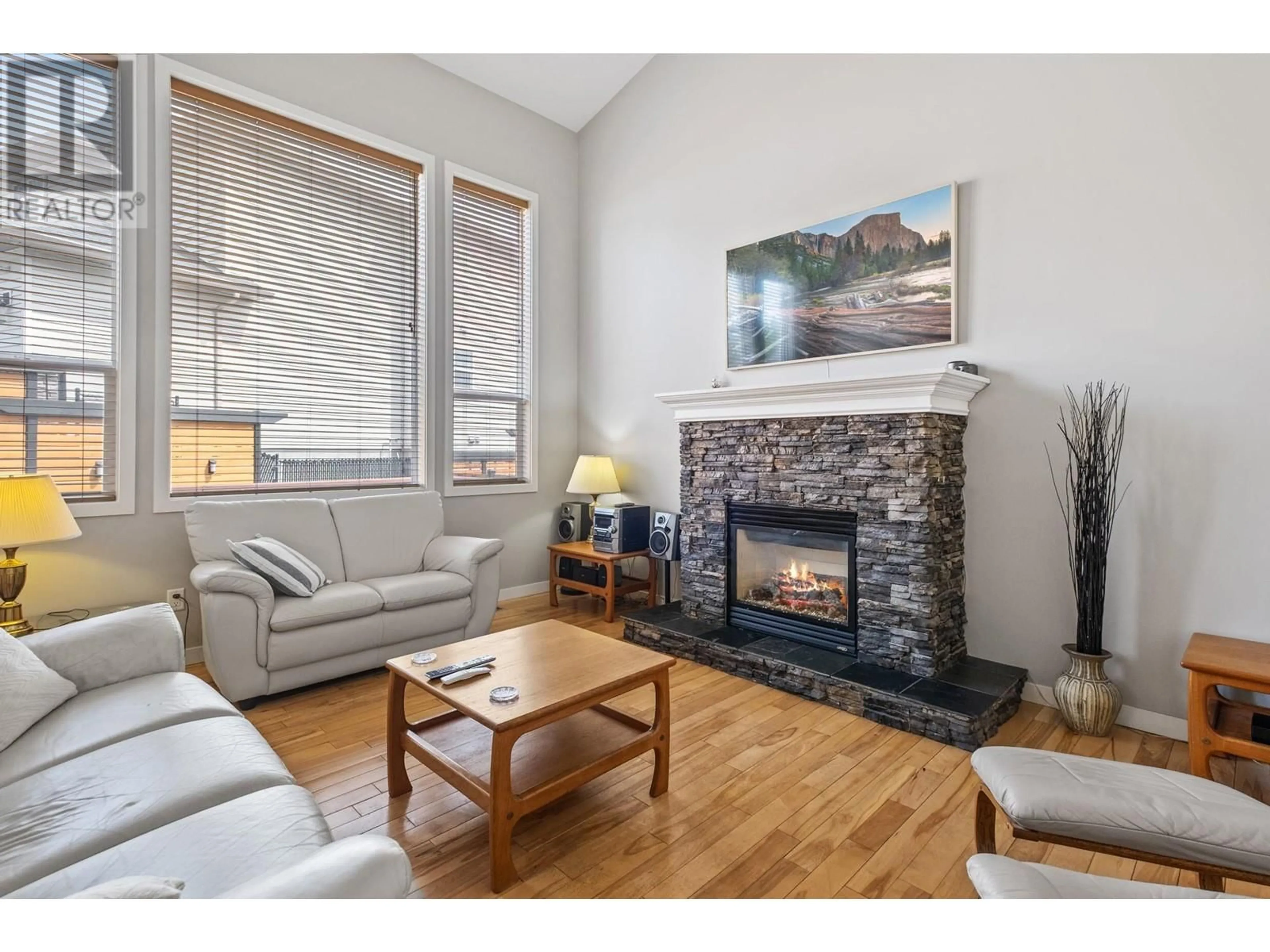 Living room with furniture, wood/laminate floor for 3501 CREEKVIEW CRESCENT, West Kelowna British Columbia V4T3C5