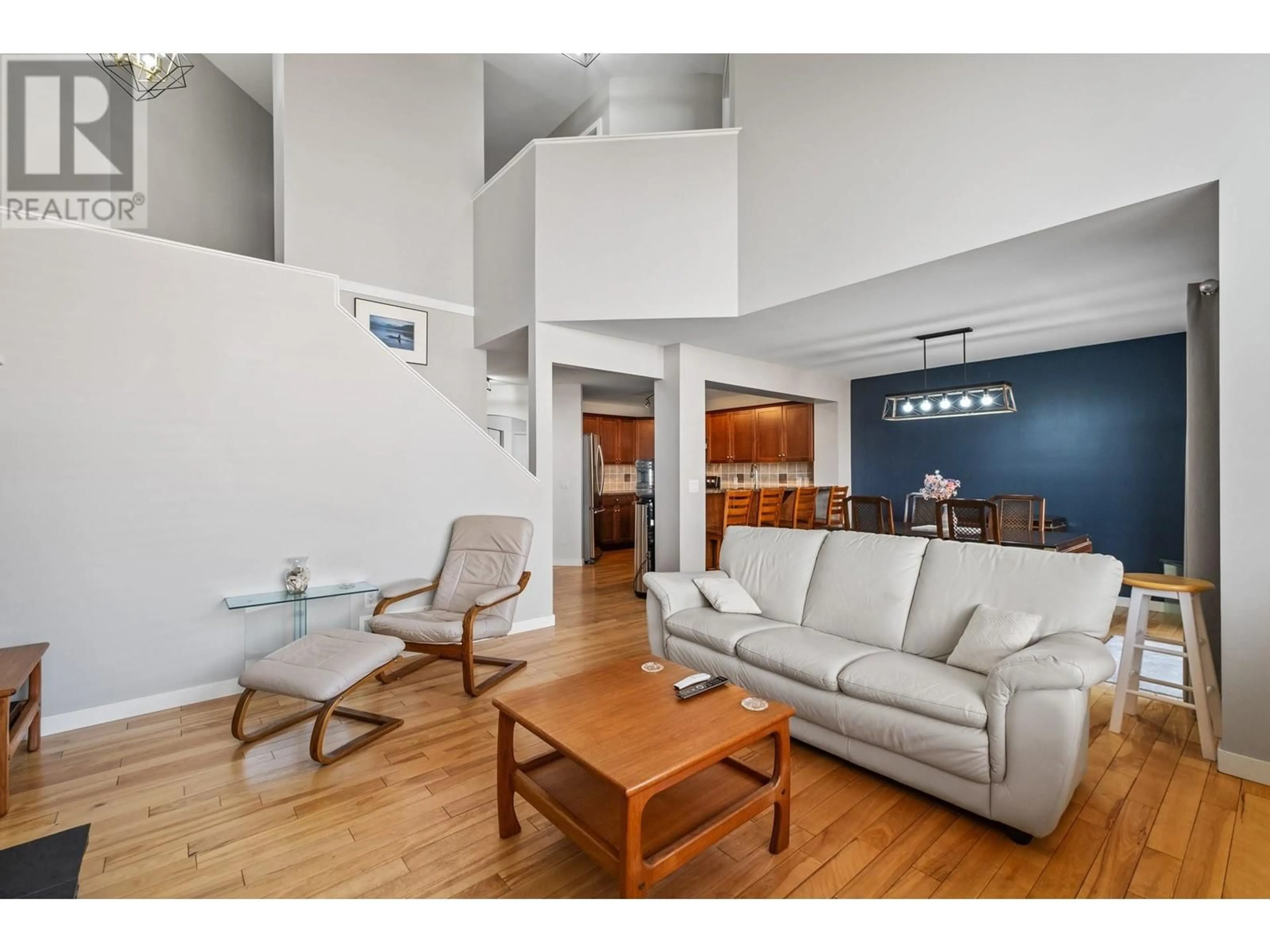 Living room with furniture, wood/laminate floor for 3501 CREEKVIEW CRESCENT, West Kelowna British Columbia V4T3C5