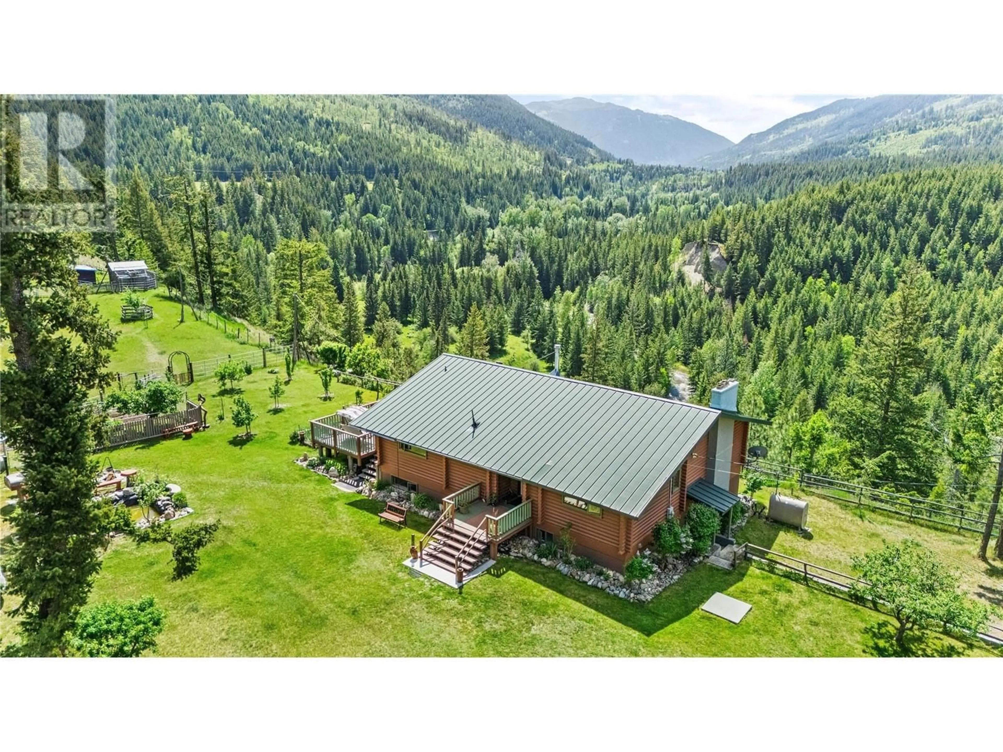 A pic from outside/outdoor area/front of a property/back of a property/a pic from drone, mountain view for 2673 AGATE BAY ROAD, Barriere British Columbia V0E2E0