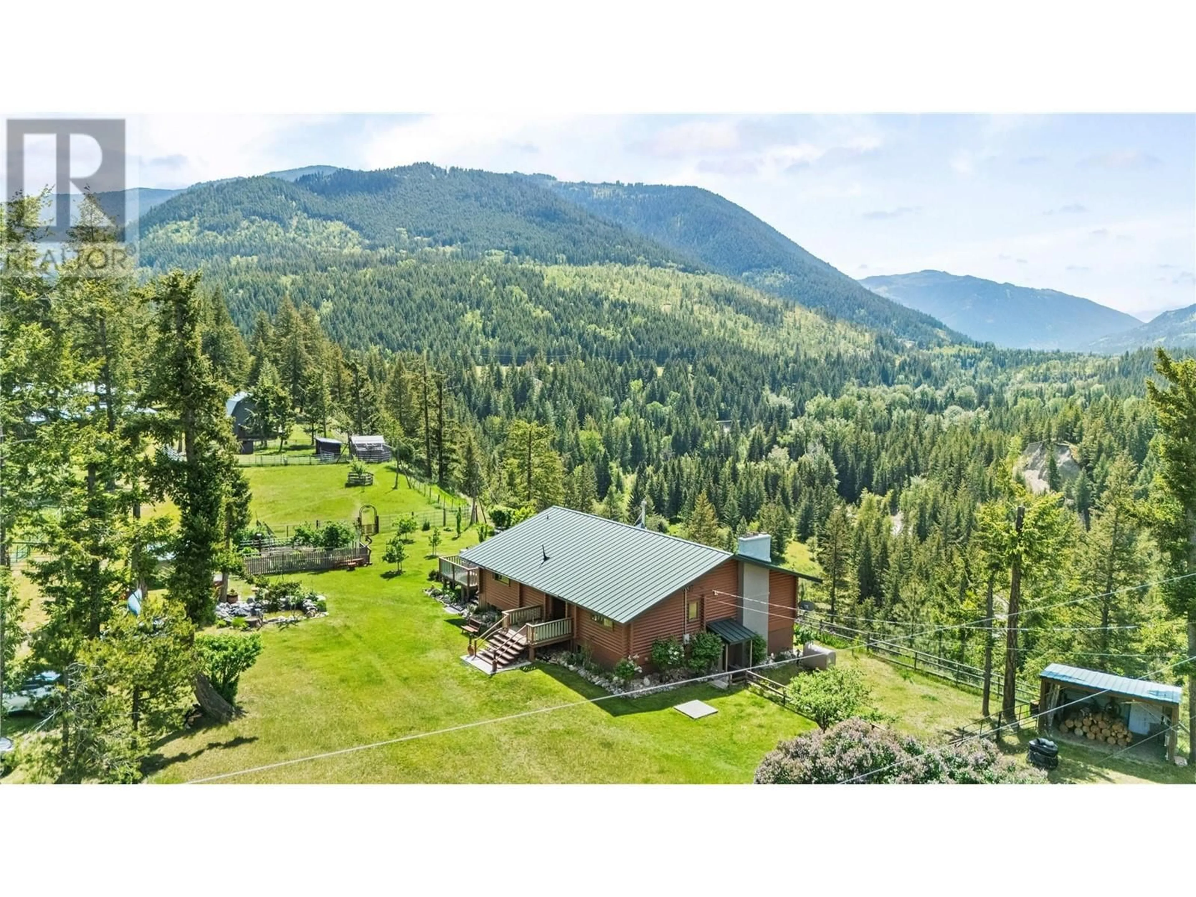 A pic from outside/outdoor area/front of a property/back of a property/a pic from drone, mountain view for 2673 AGATE BAY ROAD, Barriere British Columbia V0E2E0