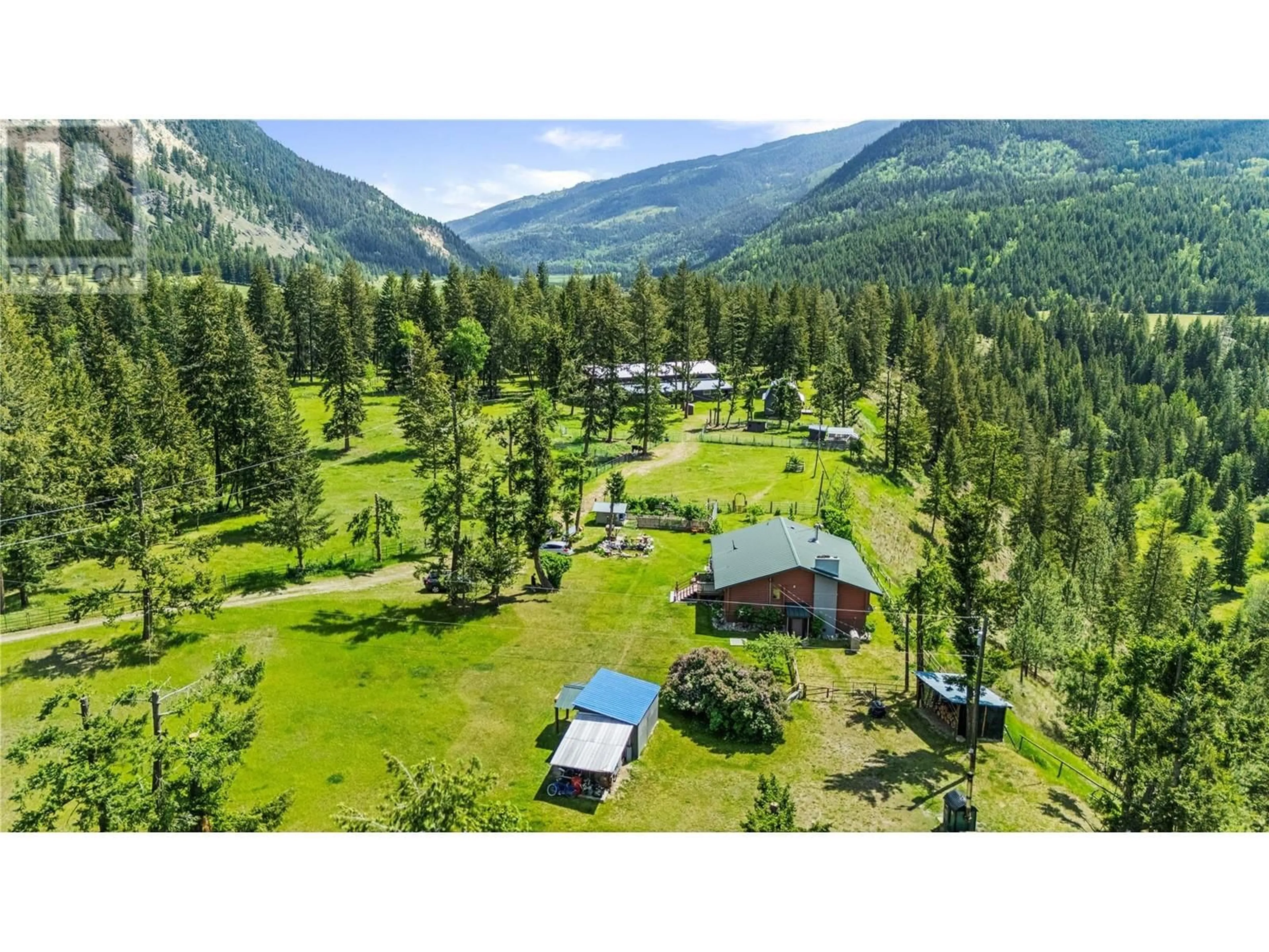 A pic from outside/outdoor area/front of a property/back of a property/a pic from drone, mountain view for 2673 AGATE BAY ROAD, Barriere British Columbia V0E2E0